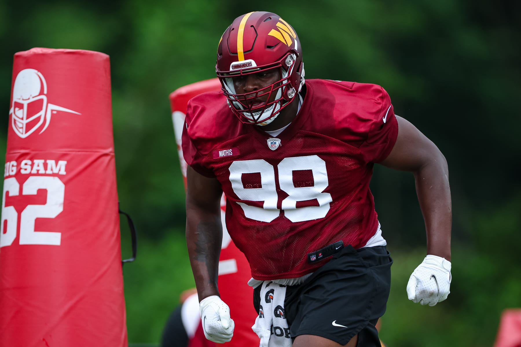 ASHBURN, VA - JUNE 14: Phidarian Mathis #98 of the Washington Commanders participates in a drill during the organized team activity at INOVA Sports Performance Center on June 14, 2022 in Ashburn, Virginia. (Photo by Scott Taetsch/Getty Images)