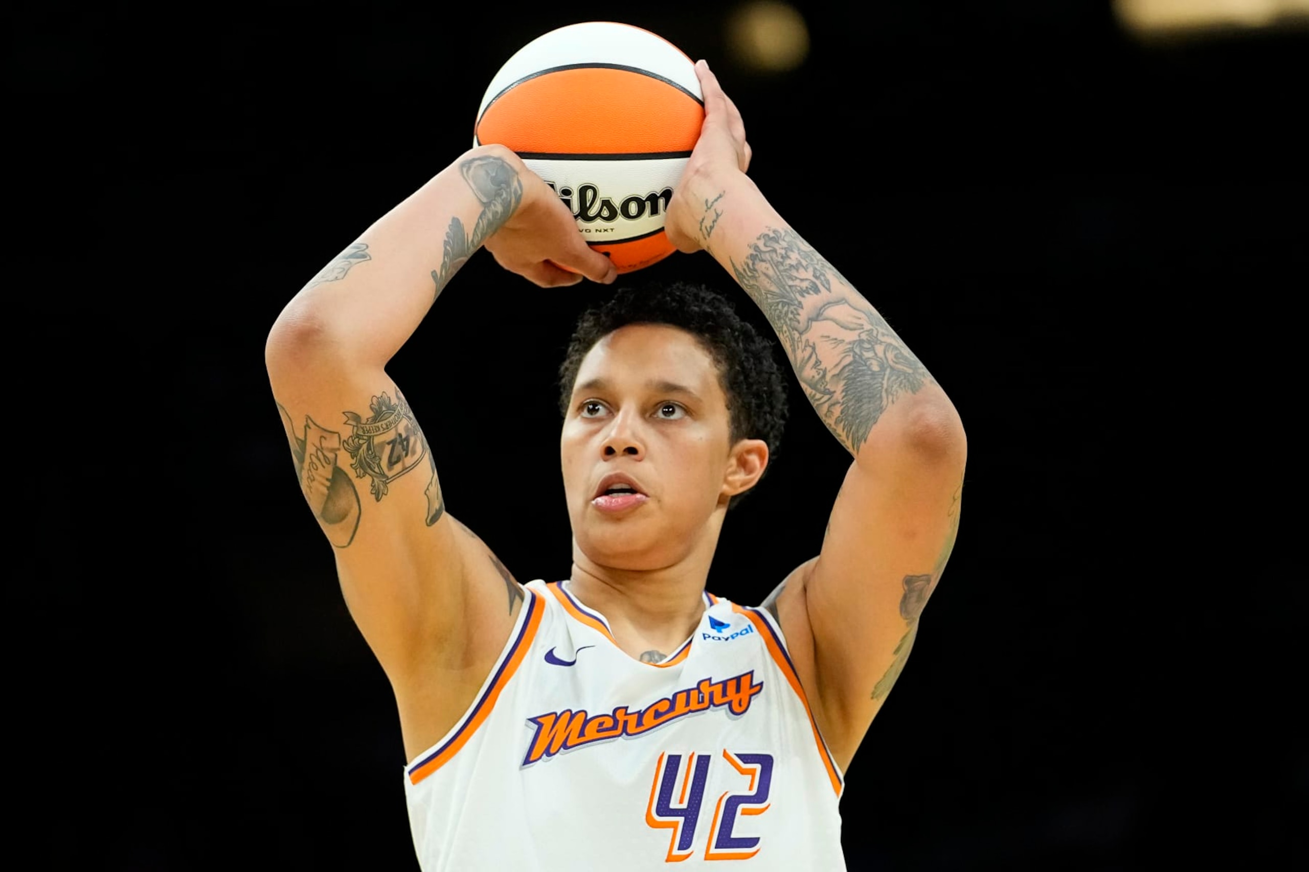 Phoenix Mercury center Brittney Griner (42) shoots a free throw against the Los Angeles Sparks during the first half of a WNBA preseason basketball game, Friday, May 12, 2023, in Phoenix. (AP Photo/Matt York)
