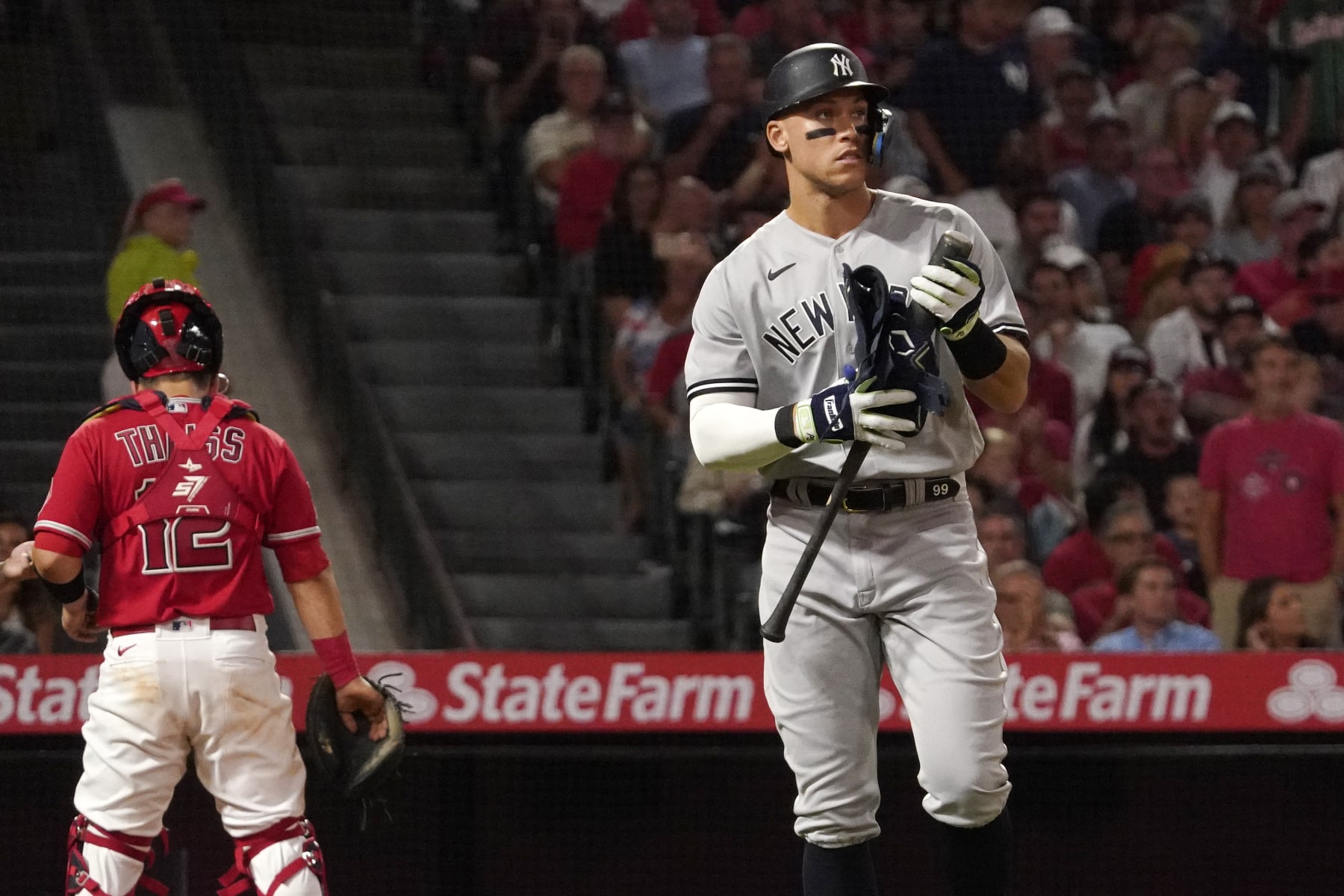 New York Yankees' Aaron Judge, right, heads to first after being intentionally walked as Los Angeles Angels catcher Matt Thaiss stands at the plate during the fifth inning of a baseball game Monday, Aug. 29, 2022, in Anaheim, Calif. (AP Photo/Mark J. Terrill) New York Yankees' Aaron Judge, right, heads to first after being intentionally walked as Los Angeles Angels catcher Matt Thaiss stands at the plate during the fifth inning of a baseball game Monday, Aug. 29, 2022, in Anaheim, Calif. (AP Photo/Mark J. Terrill)