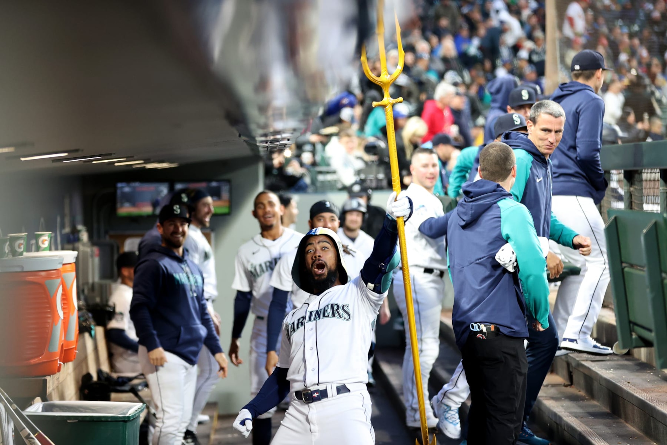 SEATTLE, WASHINGTON - APRIL 21: Teoscar Hernandez #35 of the Seattle Mariners celebrates his home run with the celebration trident during the fourth inning against the St. Louis Cardinals at T-Mobile Park on April 21, 2023 in Seattle, Washington. (Photo by Steph Chambers/Getty Images)