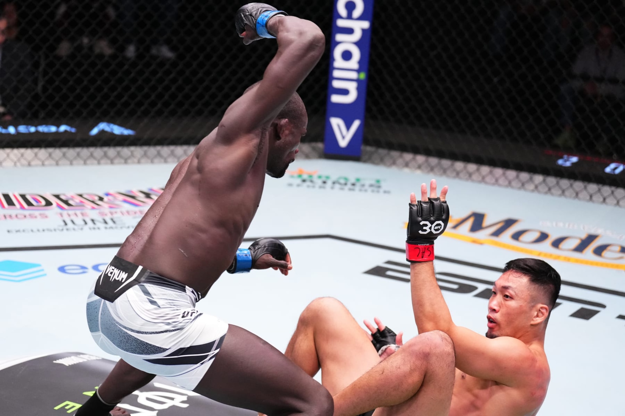 LAS VEGAS, NEVADA - MAY 20: (L-R) Themba Gorimbo of Zimbabwe punches Takashi Sato of Japan in a welterweight fight during the UFC Fight Night event at UFC APEX on May 20, 2023 in Las Vegas, Nevada. (Photo by Chris Unger/Zuffa LLC via Getty Images)