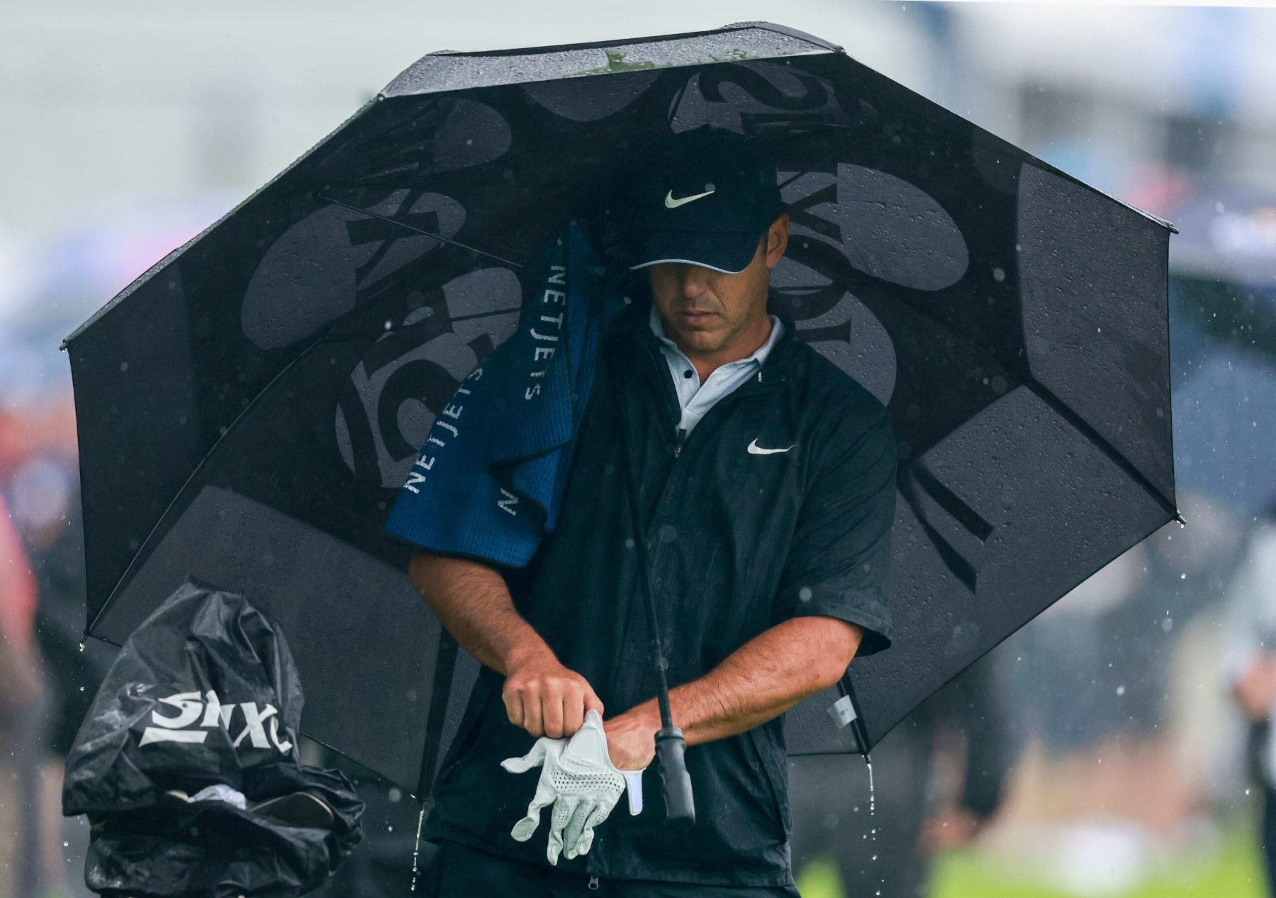 ROCHESTER, NEW YORK - MAY 20: Brooks Koepka of the United States prepares to play his second shot on the first hole during the third round of the 2023 PGA Championship at Oak Hill Country Club on May 20, 2023 in Rochester, New York. (Photo by Warren Little/Getty Images)