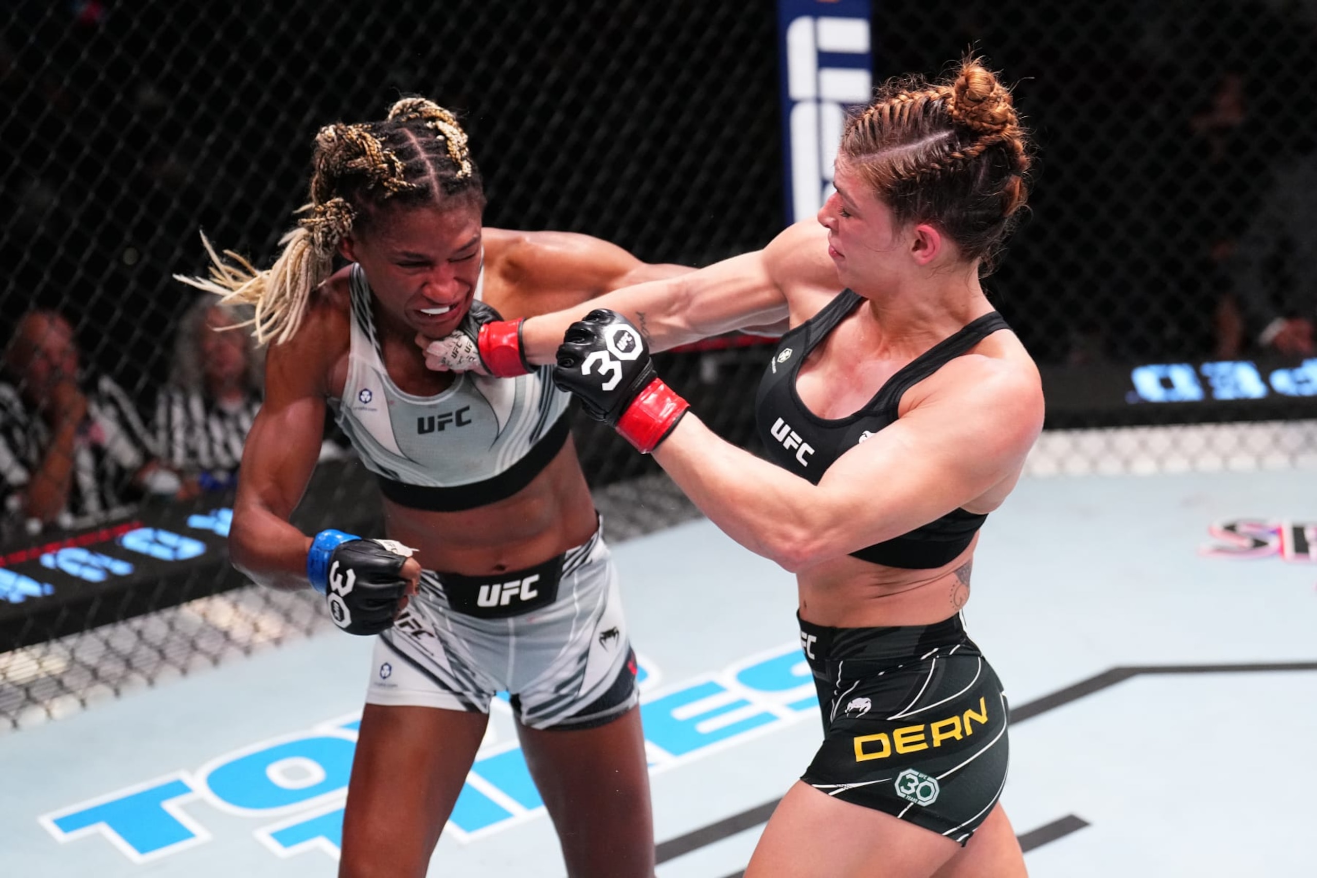 LAS VEGAS, NEVADA - MAY 20: (R-L) Mackenzie Dern punches Angela Hill in a strawweight fight during the UFC Fight Night event at UFC APEX on May 20, 2023 in Las Vegas, Nevada. (Photo by Chris Unger/Zuffa LLC via Getty Images)