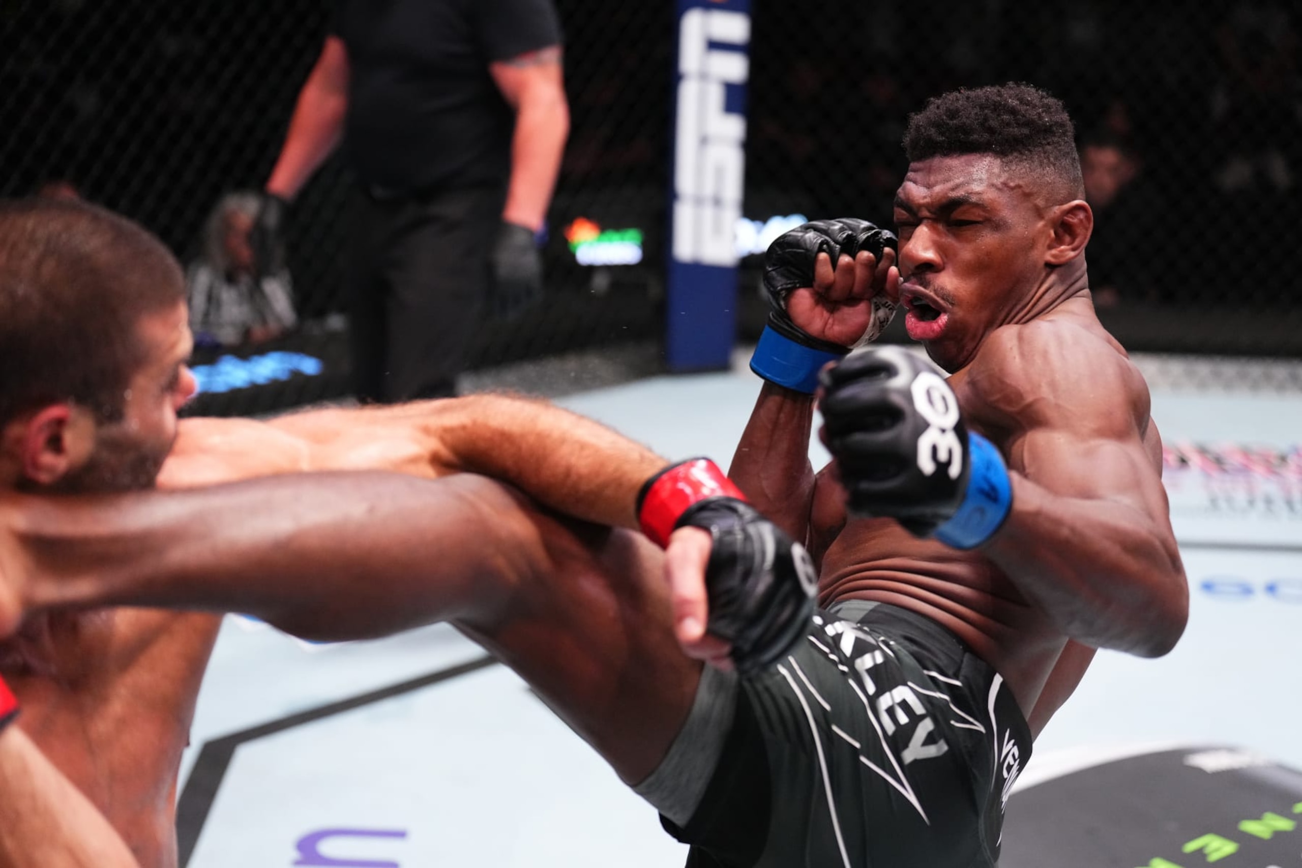 LAS VEGAS, NEVADA - MAY 20: (R-L) Joaquin Buckley lands a kick to the head of Andre Fialho of Portugal in a welterweight fight during the UFC Fight Night event at UFC APEX on May 20, 2023 in Las Vegas, Nevada. (Photo by Chris Unger/Zuffa LLC via Getty Images)