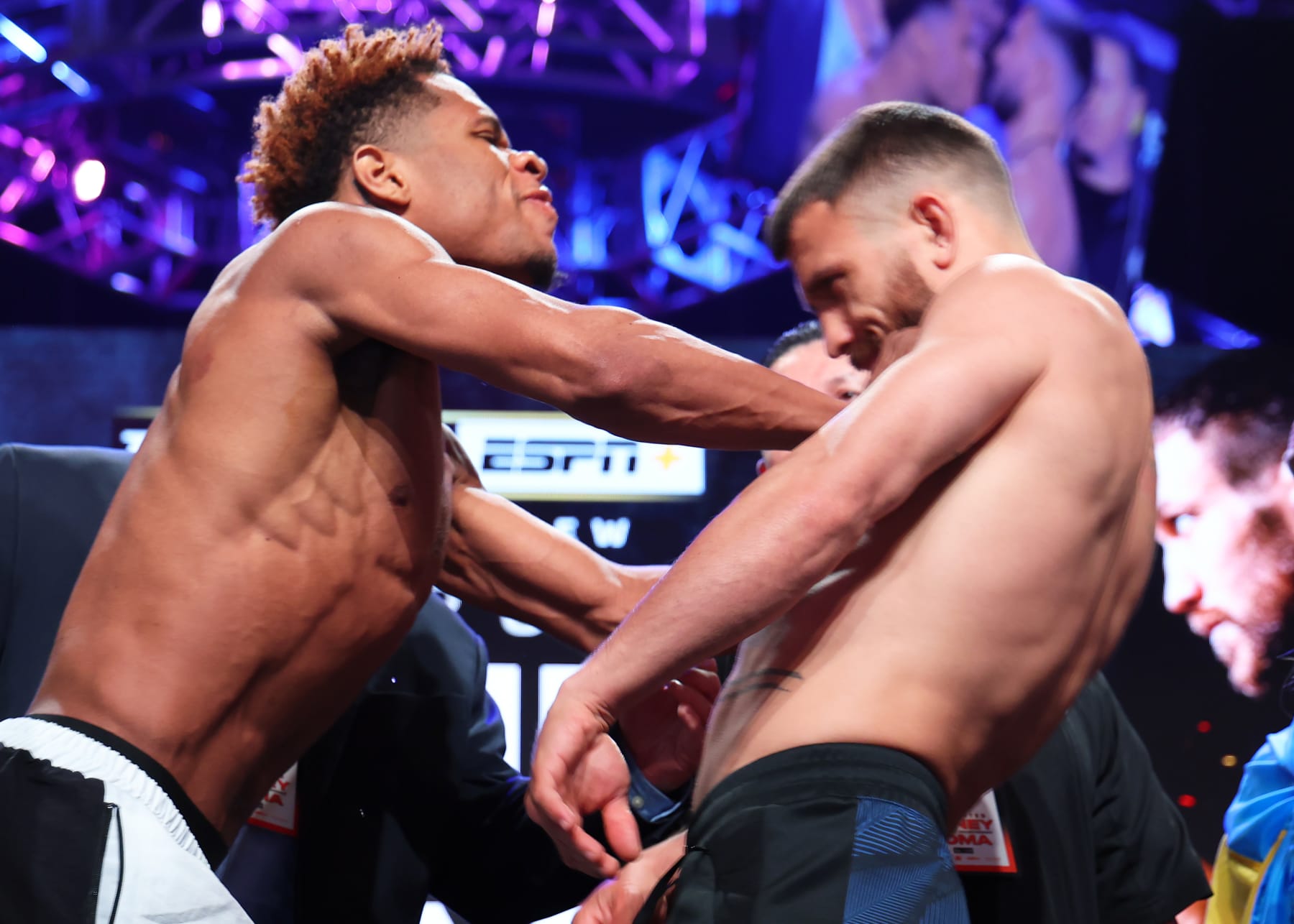 LAS VEGAS, NEVADA - MAY 19: Devin Haney (L) pushes Vasiliy Lomachenko (R) during the weigh in prior to their May 20th Undisputed lightweight championship fight at MGM Grand Hotel & Casino on May 19, 2023 in Las Vegas, Nevada. (Photo by Mikey Williams/Top Rank Inc via Getty Images)