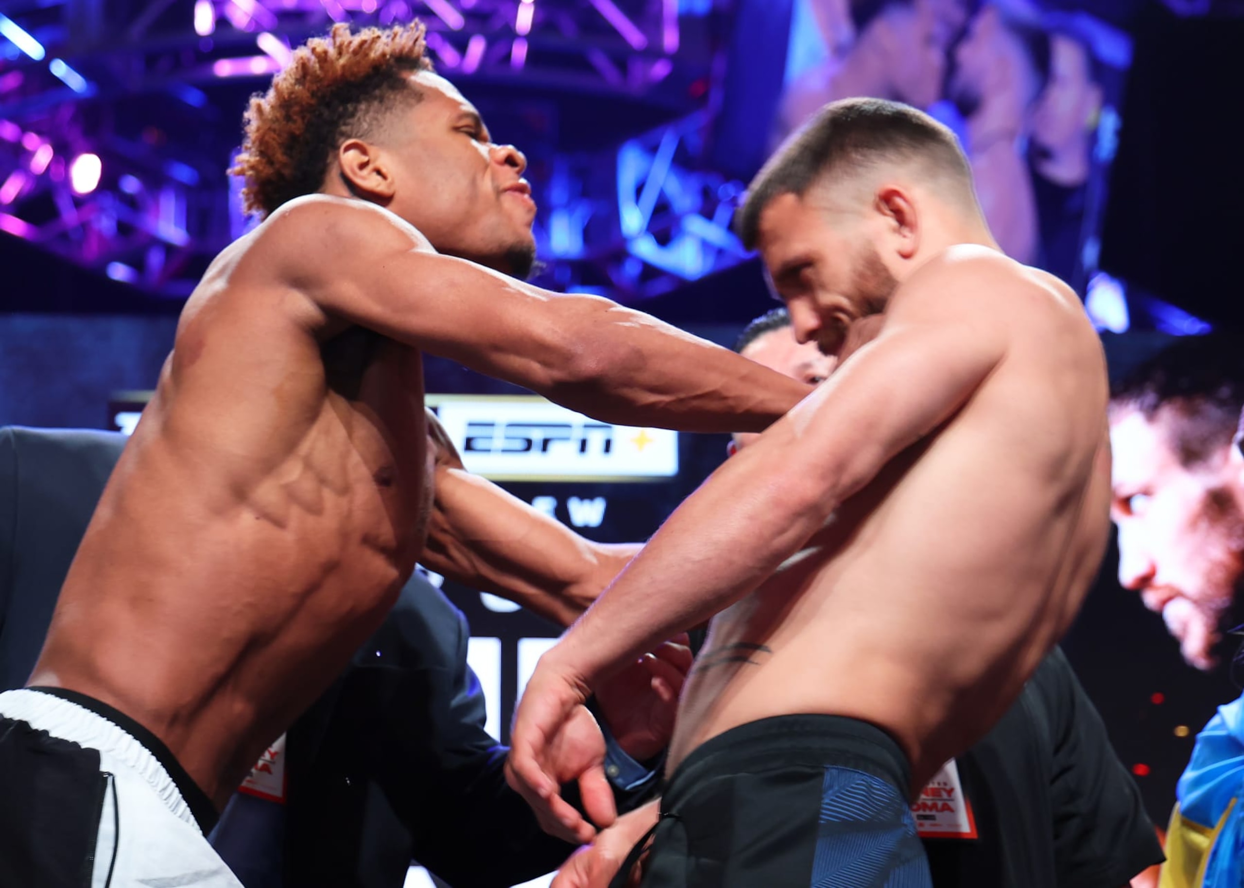 LAS VEGAS, NEVADA - MAY 19: Devin Haney (L) pushes Vasiliy Lomachenko (R) during the weigh in prior to their May 20th Undisputed lightweight championship fight at MGM Grand Hotel & Casino on May 19, 2023 in Las Vegas, Nevada. (Photo by Mikey Williams/Top Rank Inc via Getty Images)