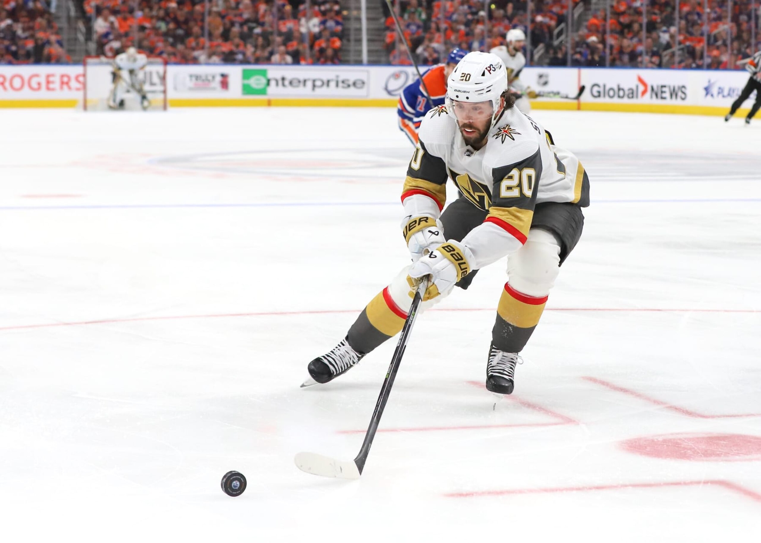 EDMONTON, CANADA - MAY 14: Chandler Stephenson #20 of the Las Vegas Golden Knights looks to gain possession of the puck in the third period against the Edmonton Oilers in Game Six of the Second Round of the 2023 Stanley Cup Playoffs on May 14, 2023 at Rogers Place in Edmonton, Alberta, Canada. (Photo by Lawrence Scott/Getty Images) EDMONTON, CANADA - MAY 14: Chandler Stephenson #20 of the Las Vegas Golden Knights looks to gain possession of the puck in the third period against the Edmonton Oilers in Game Six of the Second Round of the 2023 Stanley Cup Playoffs on May 14, 2023 at Rogers Place in Edmonton, Alberta, Canada. (Photo by Lawrence Scott/Getty Images)