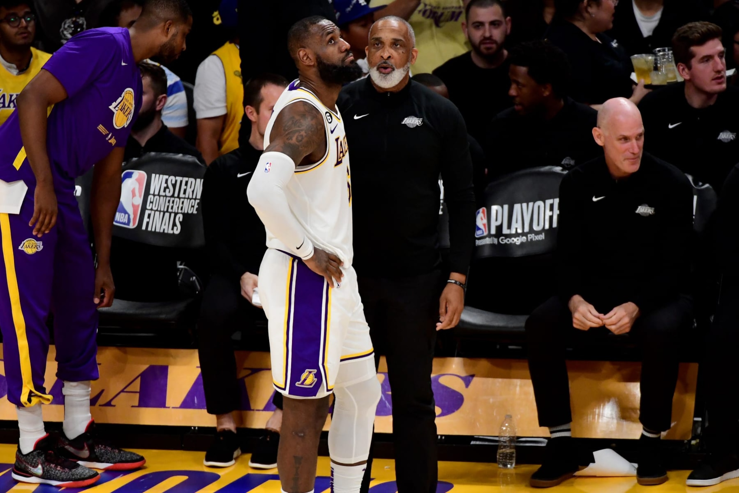 LOS ANGELES, CA - MAY 20: Assistant Coach Phil Handy and LeBron James #6 of the Los Angeles Lakers talk on the sideline during the game against the Denver Nuggets during Game Three of the Western Conference Finals on May 20, 2023 at Crypto.Com Arena in Los Angeles, California. NOTE TO USER: User expressly acknowledges and agrees that, by downloading and/or using this Photograph, user is consenting to the terms and conditions of the Getty Images License Agreement. Mandatory Copyright Notice: Copyright 2023 NBAE (Photo by Adam Pantozzi/NBAE via Getty Images)