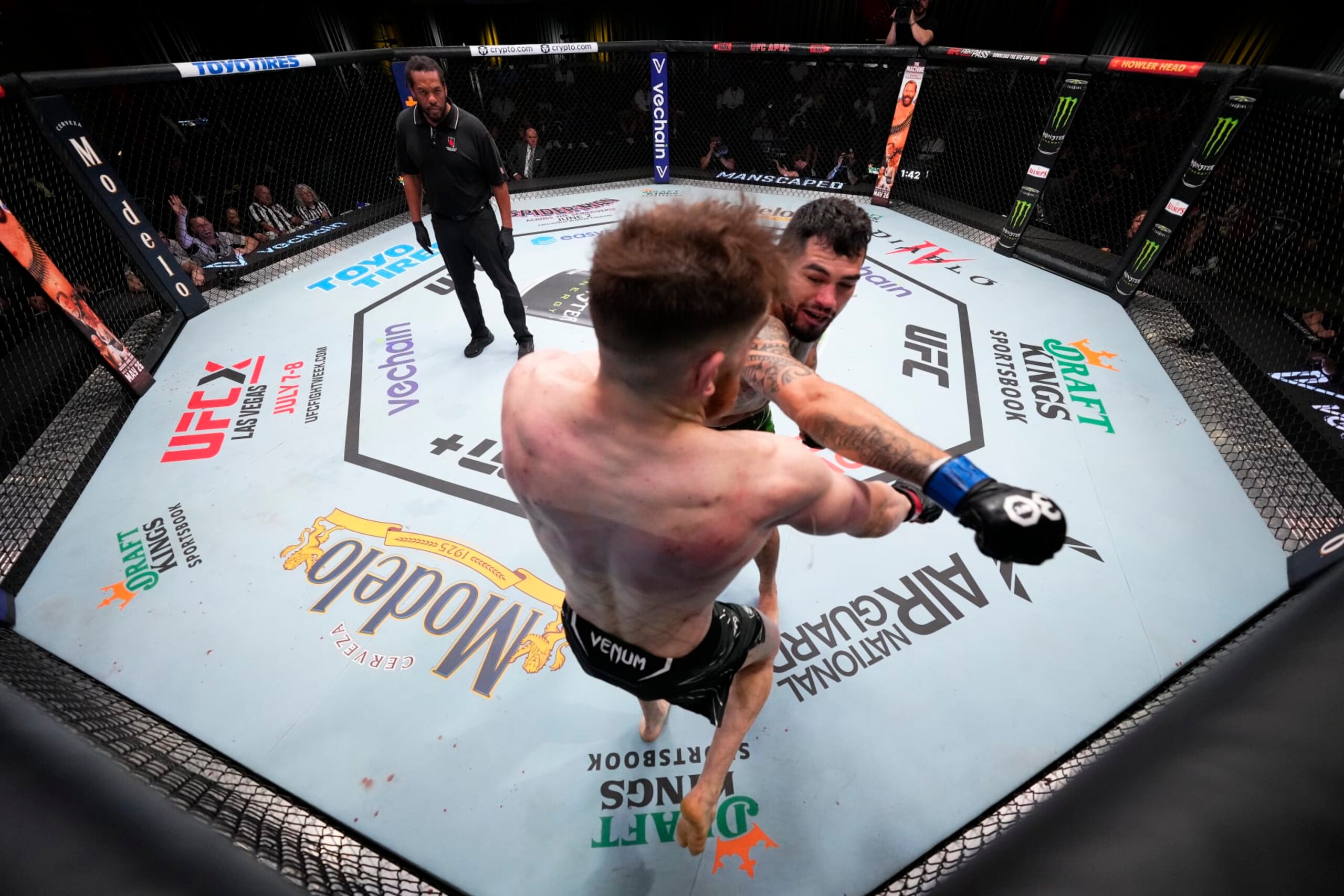 LAS VEGAS, NEVADA - MAY 20: (R-L) Anthony Hernandez punches Edmen Shahbazyan in a middleweight fight during the UFC Fight Night event at UFC APEX on May 20, 2023 in Las Vegas, Nevada. (Photo by Chris Unger/Zuffa LLC via Getty Images)
