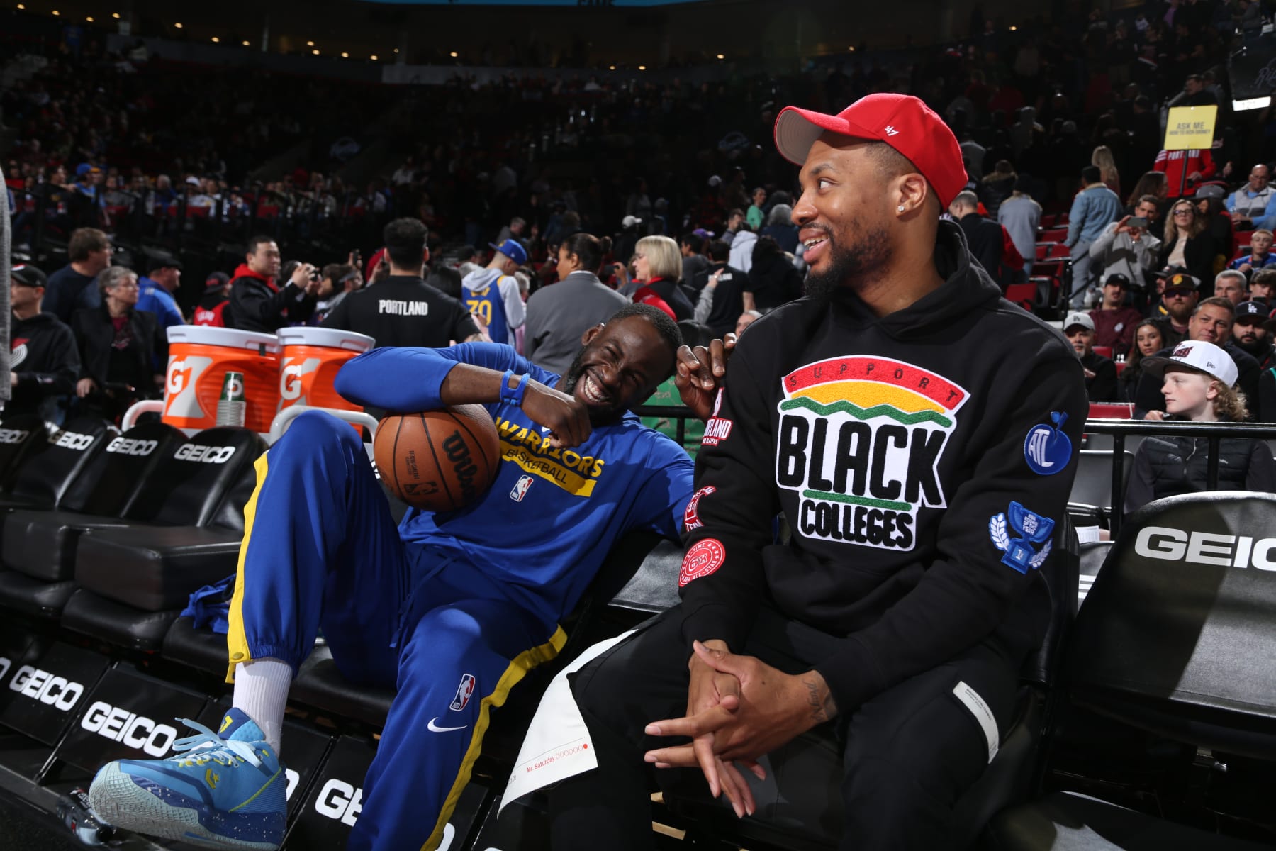 PORTLAND, OR - APRIL 9: Draymond Green #23 of the Golden State Warriors and Damian Lillard #0 of the Portland Trail Blazers before the game on April 9, 2023 at the Moda Center Arena in Portland, Oregon. NOTE TO USER: User expressly acknowledges and agrees that, by downloading and or using this photograph, user is consenting to the terms and conditions of the Getty Images License Agreement. Mandatory Copyright Notice: Copyright 2023 NBAE (Photo by Sam Forencich/NBAE via Getty Images)