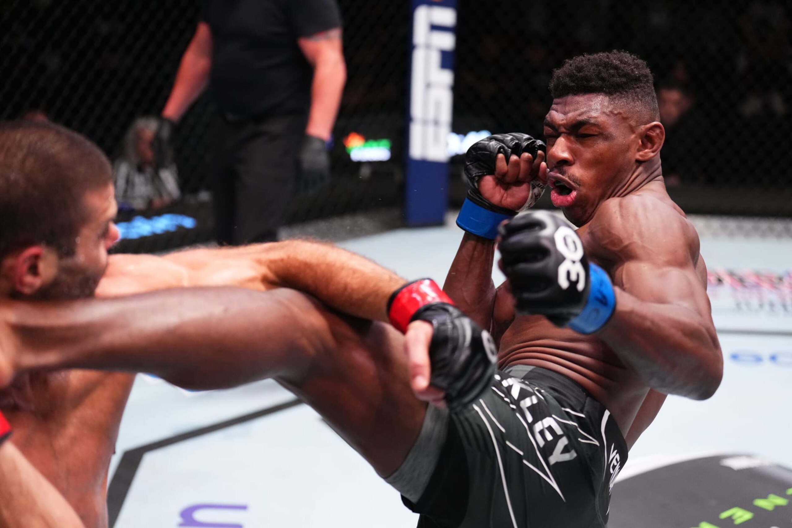 LAS VEGAS, NEVADA - MAY 20: (R-L) Joaquin Buckley lands a kick to the head of Andre Fialho of Portugal in a welterweight fight during the UFC Fight Night event at UFC APEX on May 20, 2023 in Las Vegas, Nevada. (Photo by Chris Unger/Zuffa LLC via Getty Images)