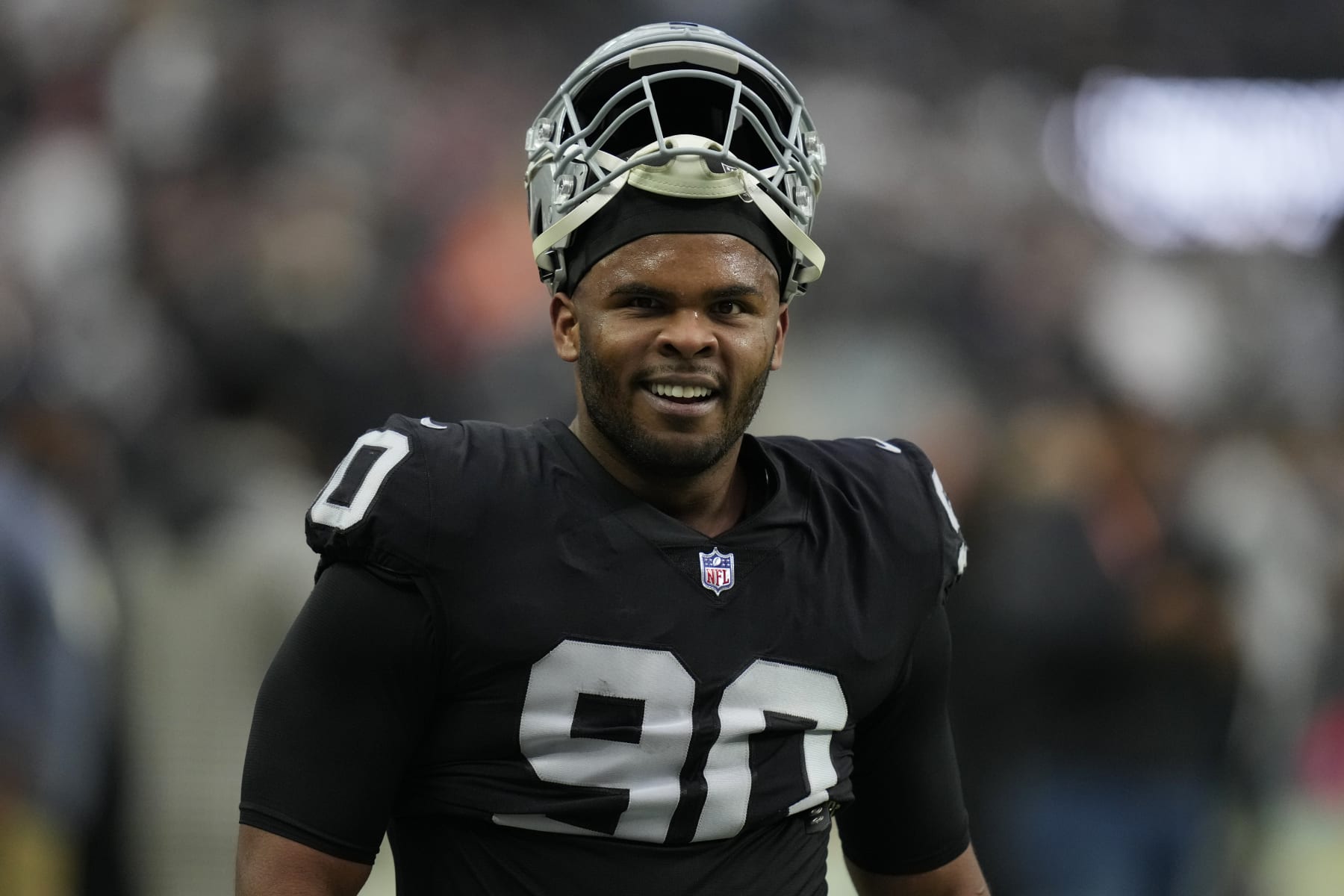 Las Vegas Raiders defensive tackle Jerry Tillery (90) warms up before an NFL football game against the New England Patriots, Monday, Dec. 19, 2022, in Las Vegas. (AP Photo/John Locher)