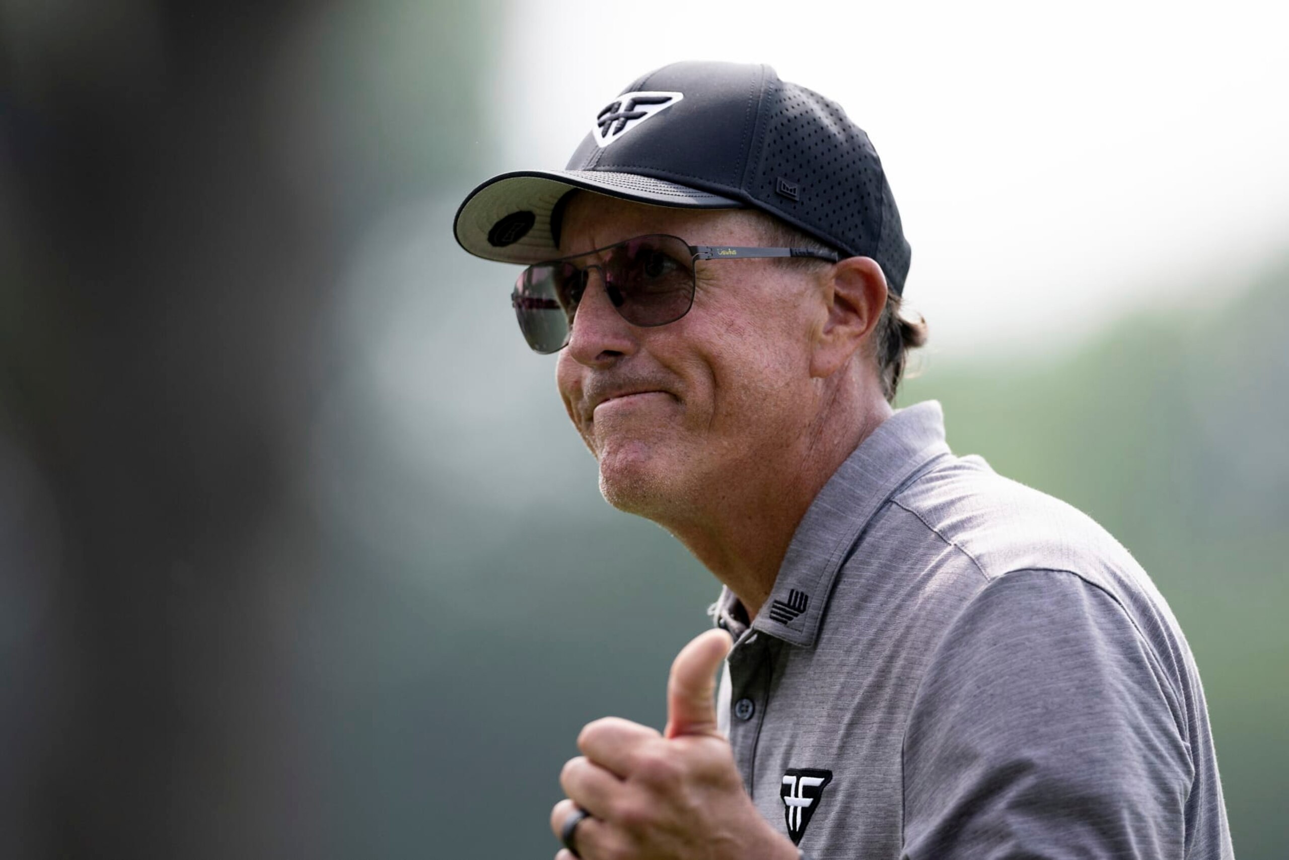 Captain Phil Mickelson of HyFlyers GC reacts on the 18th green during the first round of LIV Golf Tulsa at the Cedar Ridge Country Club on Friday, May. 12, 2023 in Broken Arrow, Oklahoma. (Photo by Katelyn Mulcahy/LIV Golf via AP)