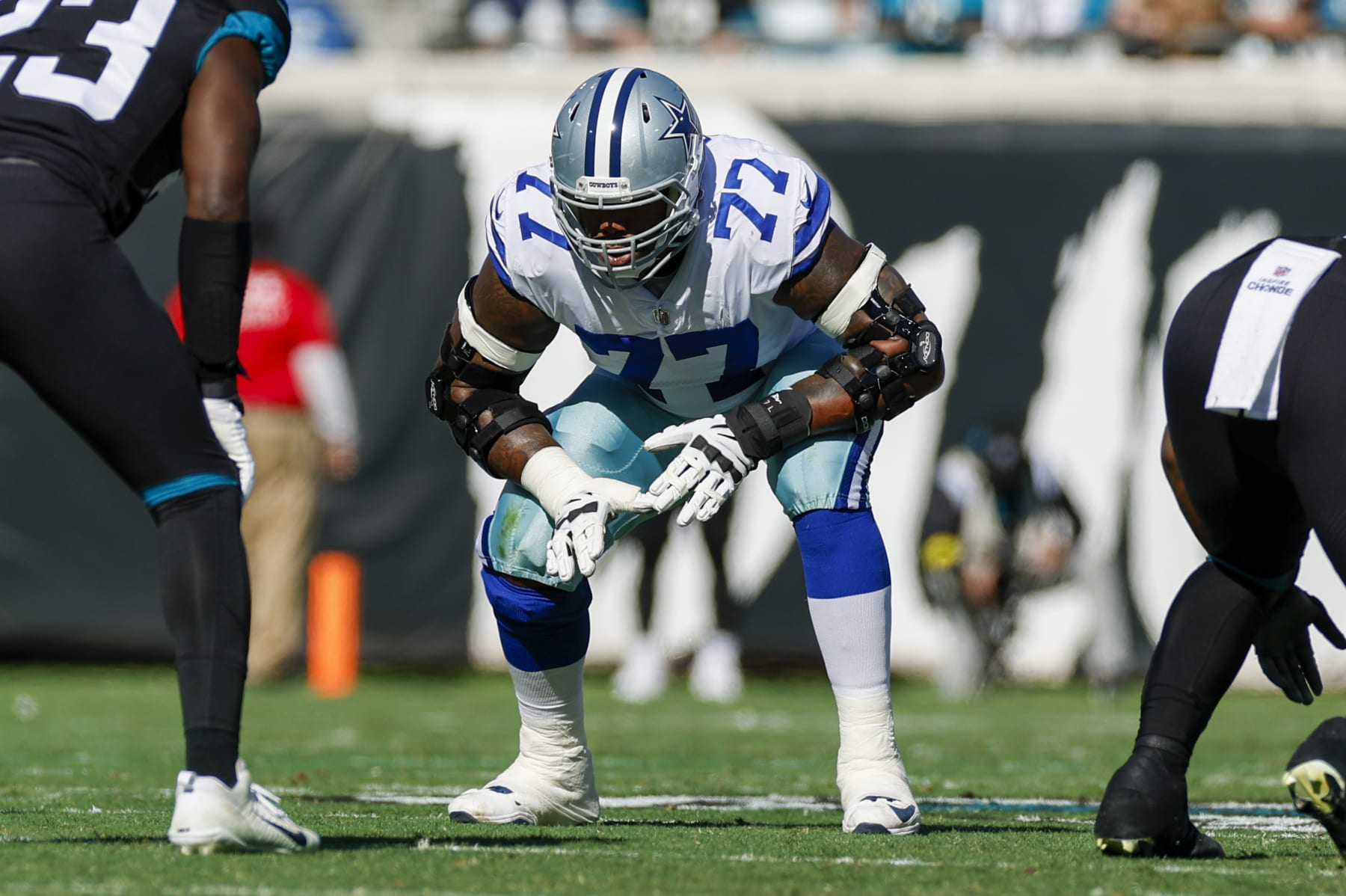 JACKSONVILLE, FL - DECEMBER 18: Dallas Cowboys offensive tackle Tyron Smith (77) lines up for a play during the game between the Dallas Cowboys and the Jacksonville Jaguars on December 18, 2022 at tIAA Bank Field in Jacksonville, Fl. (Photo by David Rosenblum/Icon Sportswire via Getty Images)