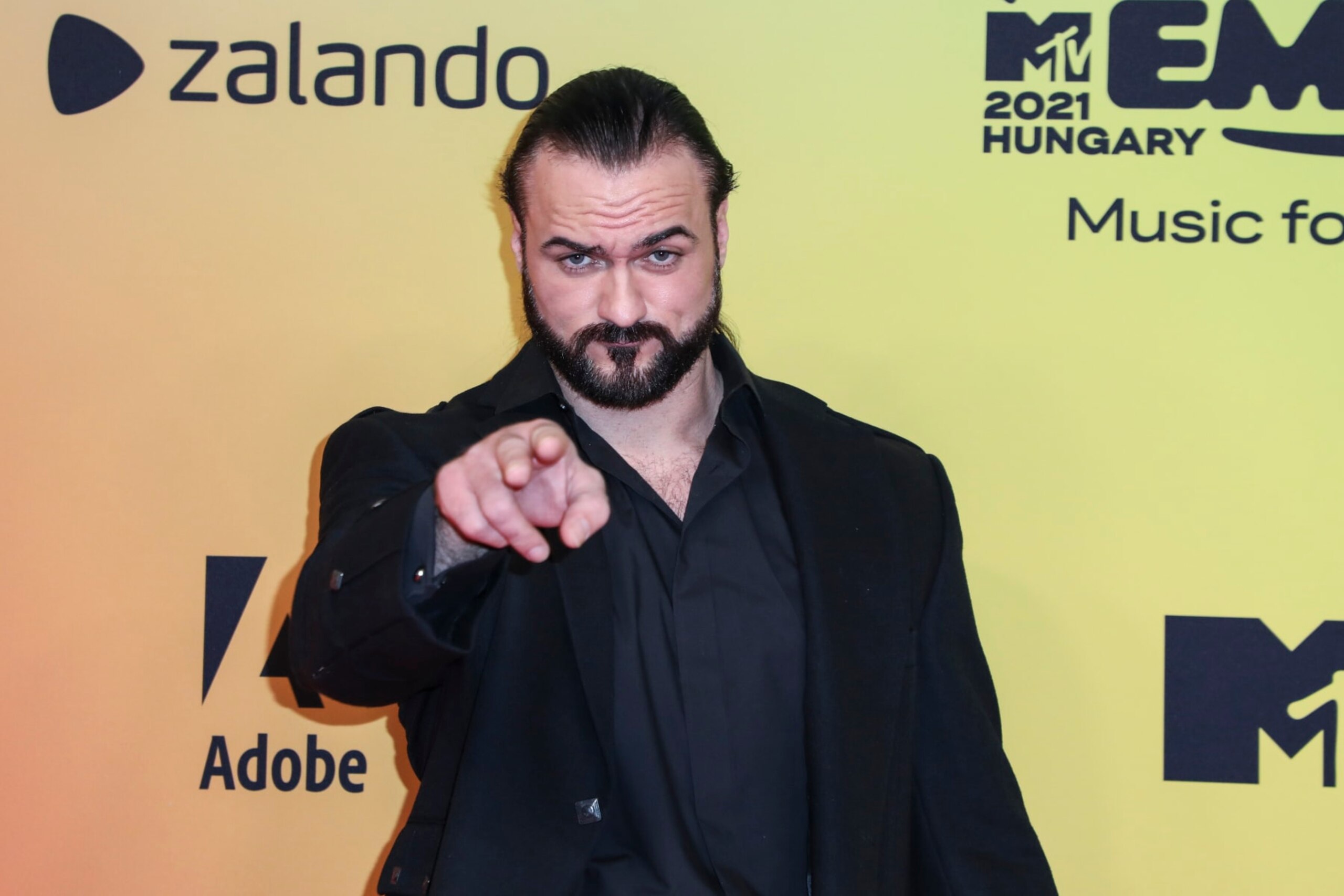 Drew McIntyre poses for photographers upon arrival at the European MTV Awards in Budapest, Hungary, Sunday, Nov. 14, 2021. (Photo by Vianney Le Caer/Invision/AP) Drew McIntyre poses for photographers upon arrival at the European MTV Awards in Budapest, Hungary, Sunday, Nov. 14, 2021. (Photo by Vianney Le Caer/Invision/AP)