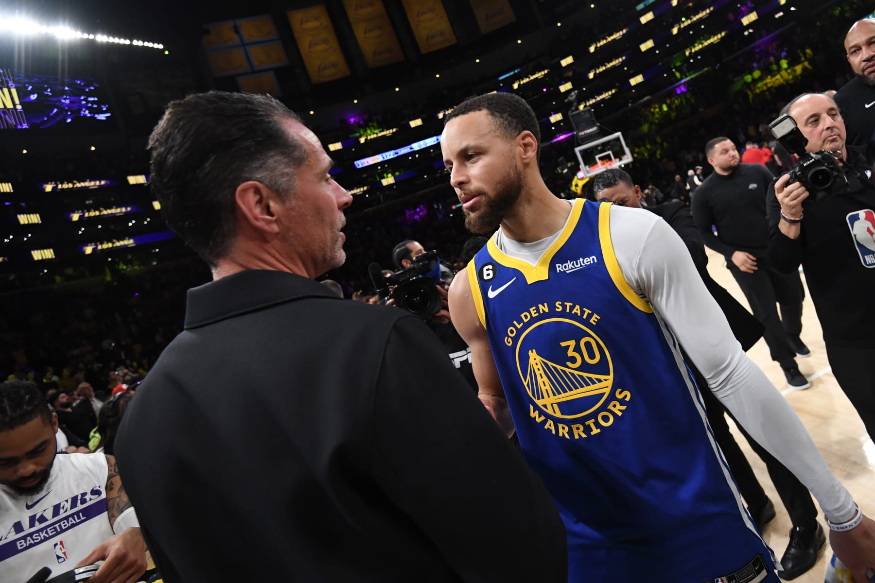 LOS ANGELES, CA - MAY 12: General Manager Rob Pelinka of the Los Angeles Lakers and Stephen Curry #30 of the Golden State Warriors after Game Six of the Western Conference Semi-Finals of the 2023 NBA Playoffs on May 12, 2023 at Crypto.com Arena in Los Angeles, California. NOTE TO USER: User expressly acknowledges and agrees that, by downloading and/or using this Photograph, user is consenting to the terms and conditions of the Getty Images License Agreement. Mandatory Copyright Notice: Copyright 2023 NBAE (Photo by Noah Graham/NBAE via Getty Images)