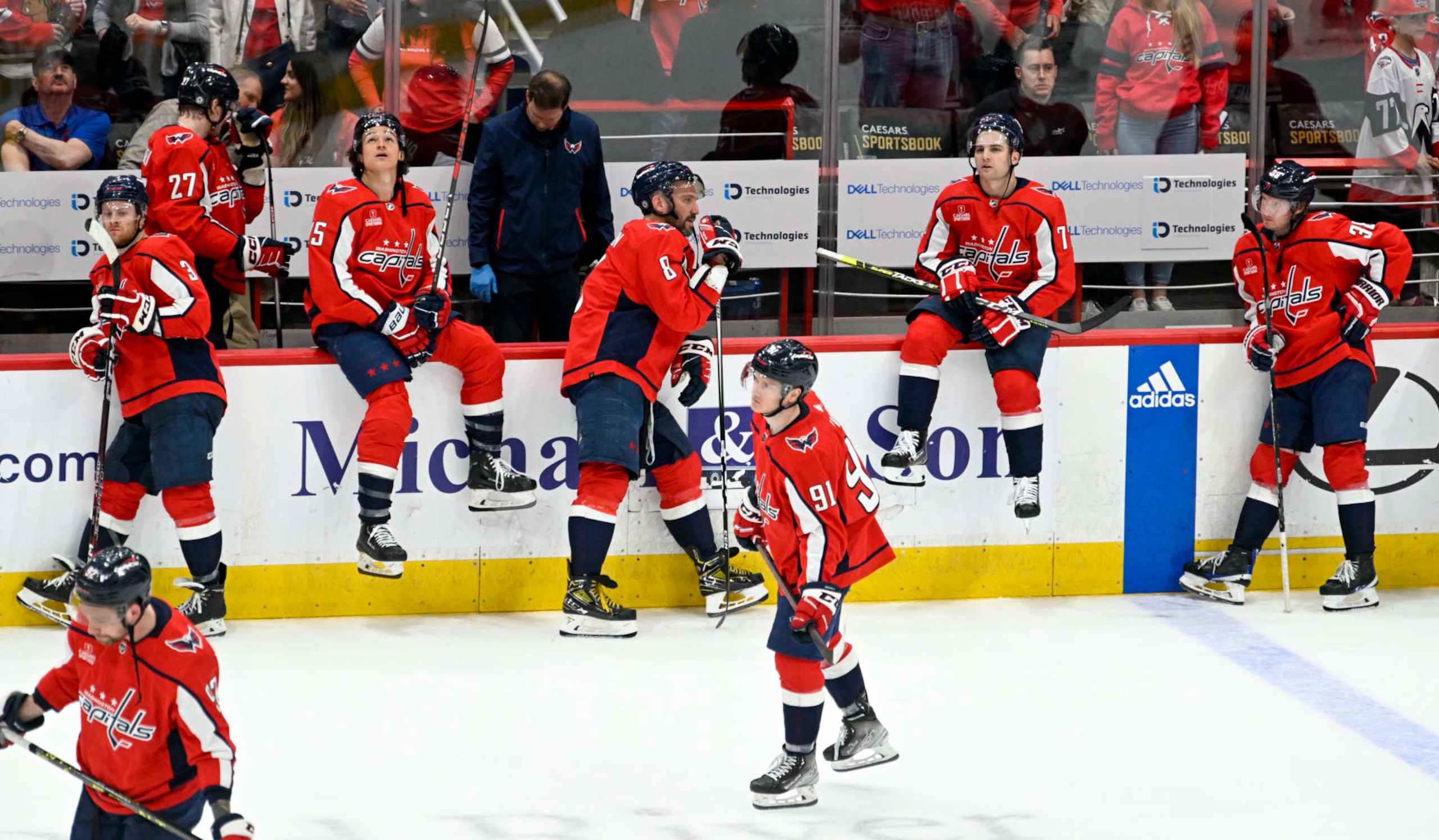 WASHINGTON, DC - APRIL 13:  Washington Capitals left wing Alex Ovechkin (8) and his teammates react after losing to the New Jersey Devils in overtime during the final game of the season at Capital One Arena on April 13, 2023.  (Photo by Jonathan Newton/The Washington Post via Getty Images)