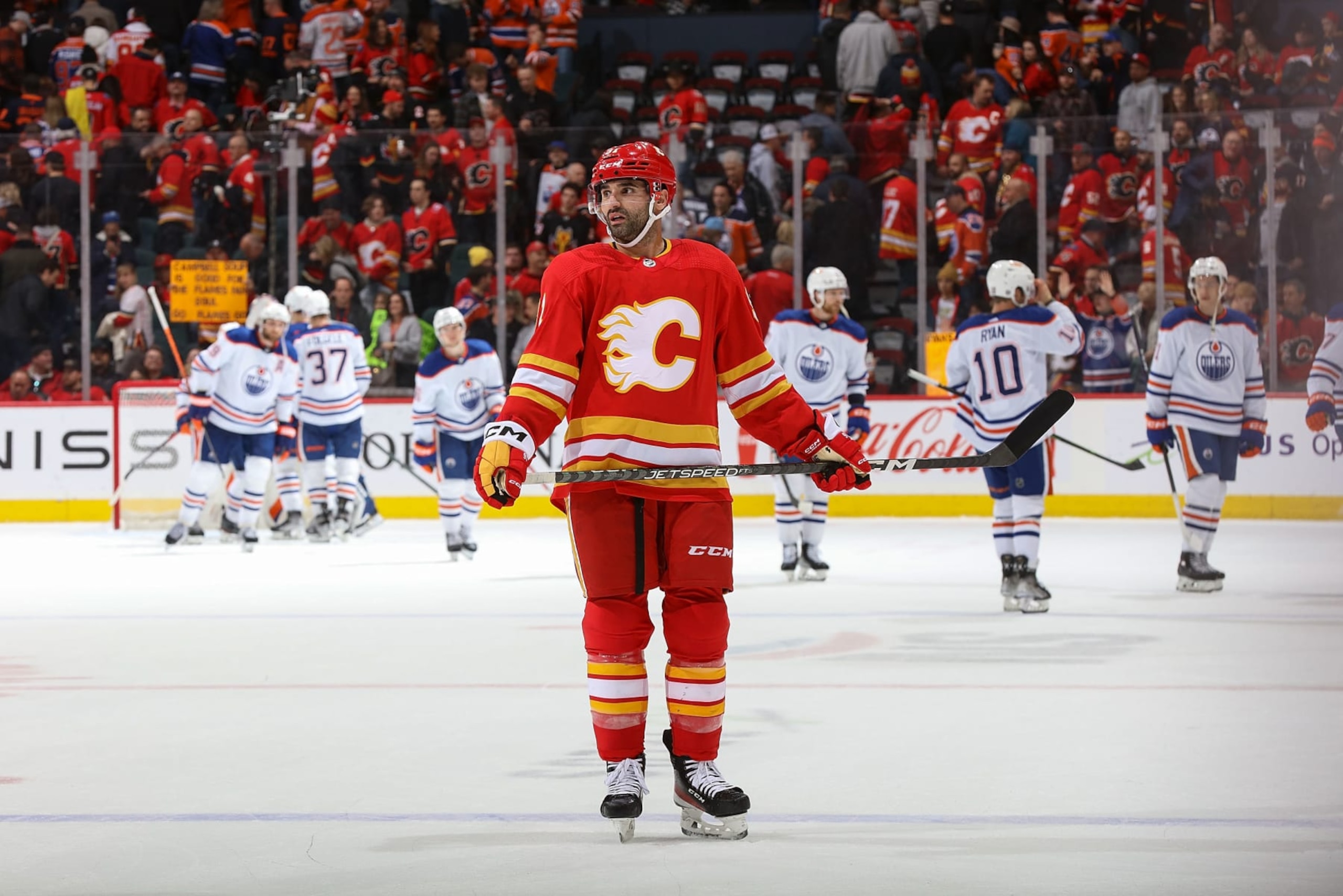 CALGARY, AB - DECEMBER 27: Nazem Kadri #91 of the Calgary Flames takes a moment before leaving the ice after a loss against the Edmonton Oilers at Scotiabank Saddledome on December 27, 2022 in Calgary, Alberta, Canada. (Photo by Gerry Thomas/NHLI via Getty Images)