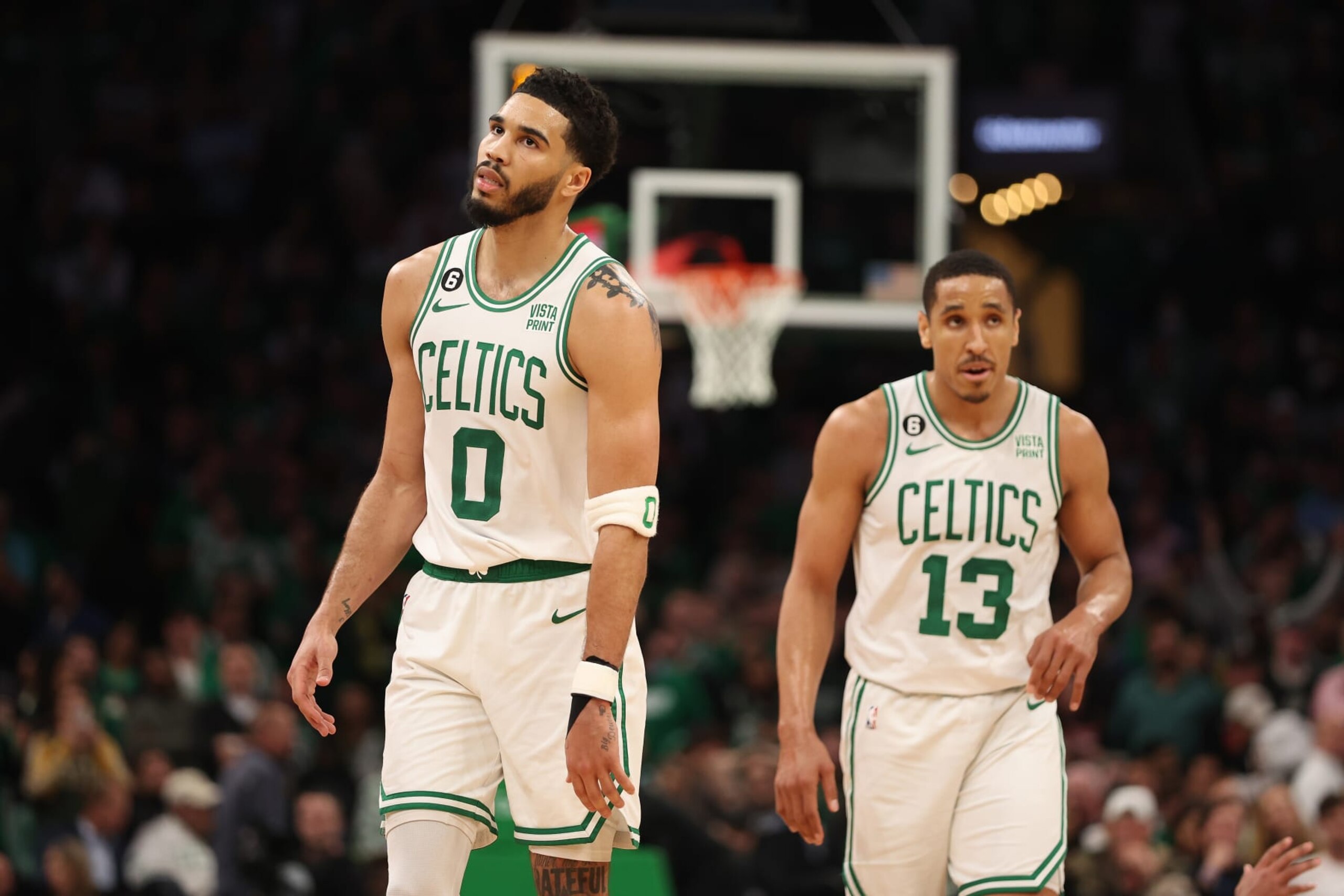 BOSTON, MASSACHUSETTS - MAY 17: Jayson Tatum #0 and Malcolm Brogdon #13 of the Boston Celtics walk backcourt during the fourth quarter of game one of the Eastern Conference Finals against the Miami Heat at TD Garden on May 17, 2023 in Boston, Massachusetts. NOTE TO USER: User expressly acknowledges and agrees that, by downloading and or using this photograph, User is consenting to the terms and conditions of the Getty Images License Agreement. (Photo by Adam Glanzman/Getty Images) BOSTON, MASSACHUSETTS - MAY 17: Jayson Tatum #0 and Malcolm Brogdon #13 of the Boston Celtics walk backcourt during the fourth quarter of game one of the Eastern Conference Finals against the Miami Heat at TD Garden on May 17, 2023 in Boston, Massachusetts. NOTE TO USER: User expressly acknowledges and agrees that, by downloading and or using this photograph, User is consenting to the terms and conditions of the Getty Images License Agreement. (Photo by Adam Glanzman/Getty Images)