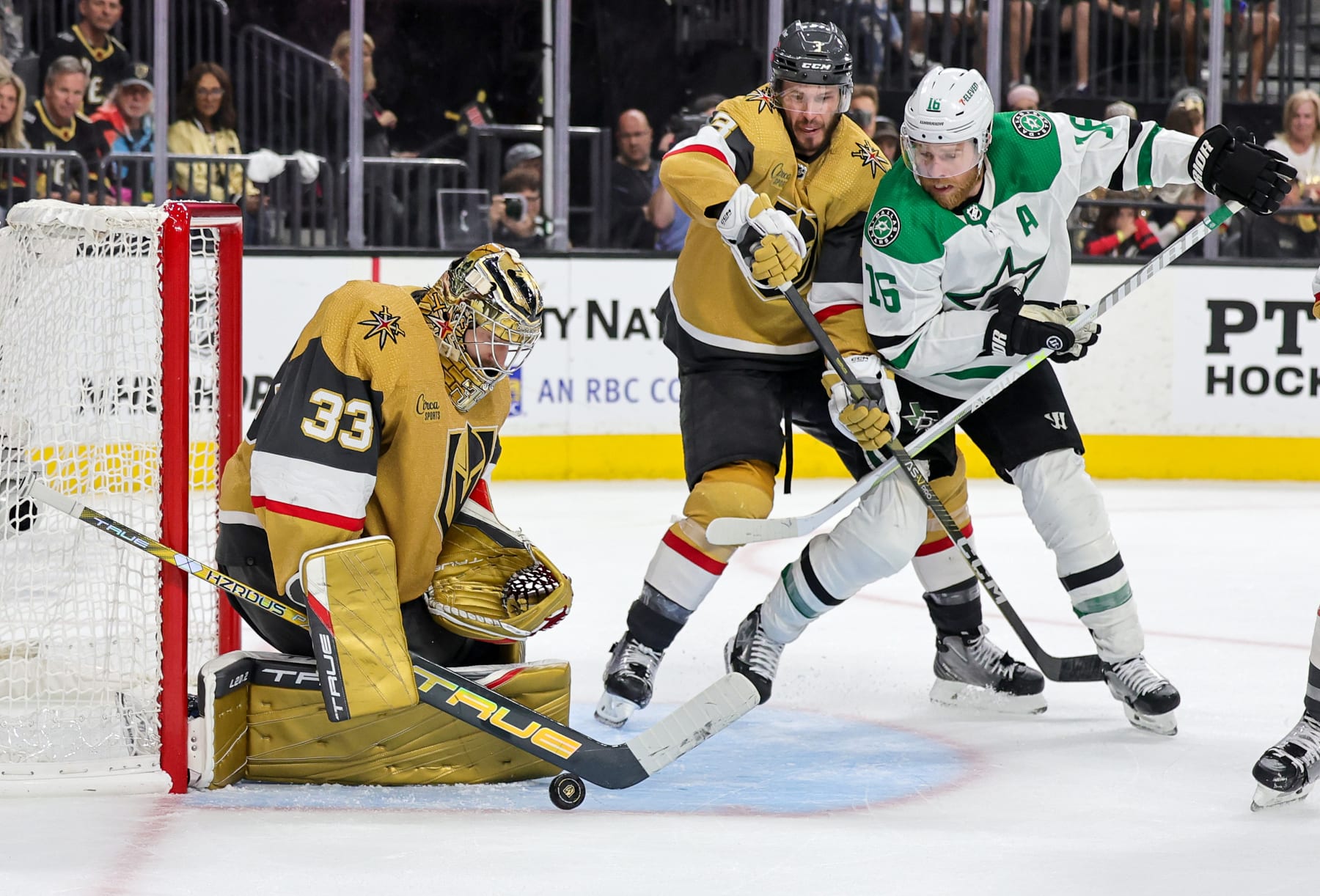 LAS VEGAS, NEVADA - MAY 21: Adin Hill #33 of the Vegas Golden Knights makes a save as Brayden McNabb #3 of the Golden Knights and Joe Pavelski #16 of the Dallas Stars look for a rebound in the third period of Game Two of the Western Conference Final of the 2023 Stanley Cup Playoffs at T-Mobile Arena on May 21, 2023 in Las Vegas, Nevada. The Golden Knights defeated the Stars 3-2 in overtime. (Photo by Ethan Miller/Getty Images)