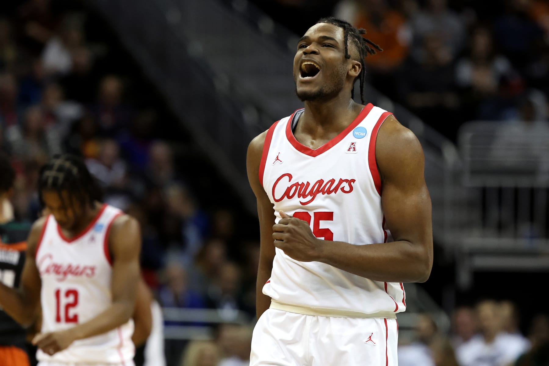 KANSAS CITY, MISSOURI - MARCH 24: Jarace Walker #25 of the Houston Cougars reacts to a play against the Miami Hurricanes during the second half in the Sweet 16 round of the NCAA Men's Basketball Tournament at T-Mobile Center on March 24, 2023 in Kansas City, Missouri. (Photo by Gregory Shamus/Getty Images)