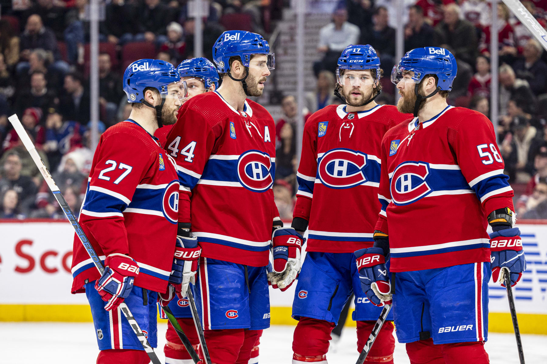 MONTREAL, CANADA - MARCH 21: Montreal Canadiens talk before the play during the first period of the NHL regular season game between the Montreal Canadiens and the Tampa Bay Lightning at the Bell Centre on March 21, 2023 in Montreal, Quebec, Canada. (Photo by Vitor Munhoz/NHLI via Getty Images)