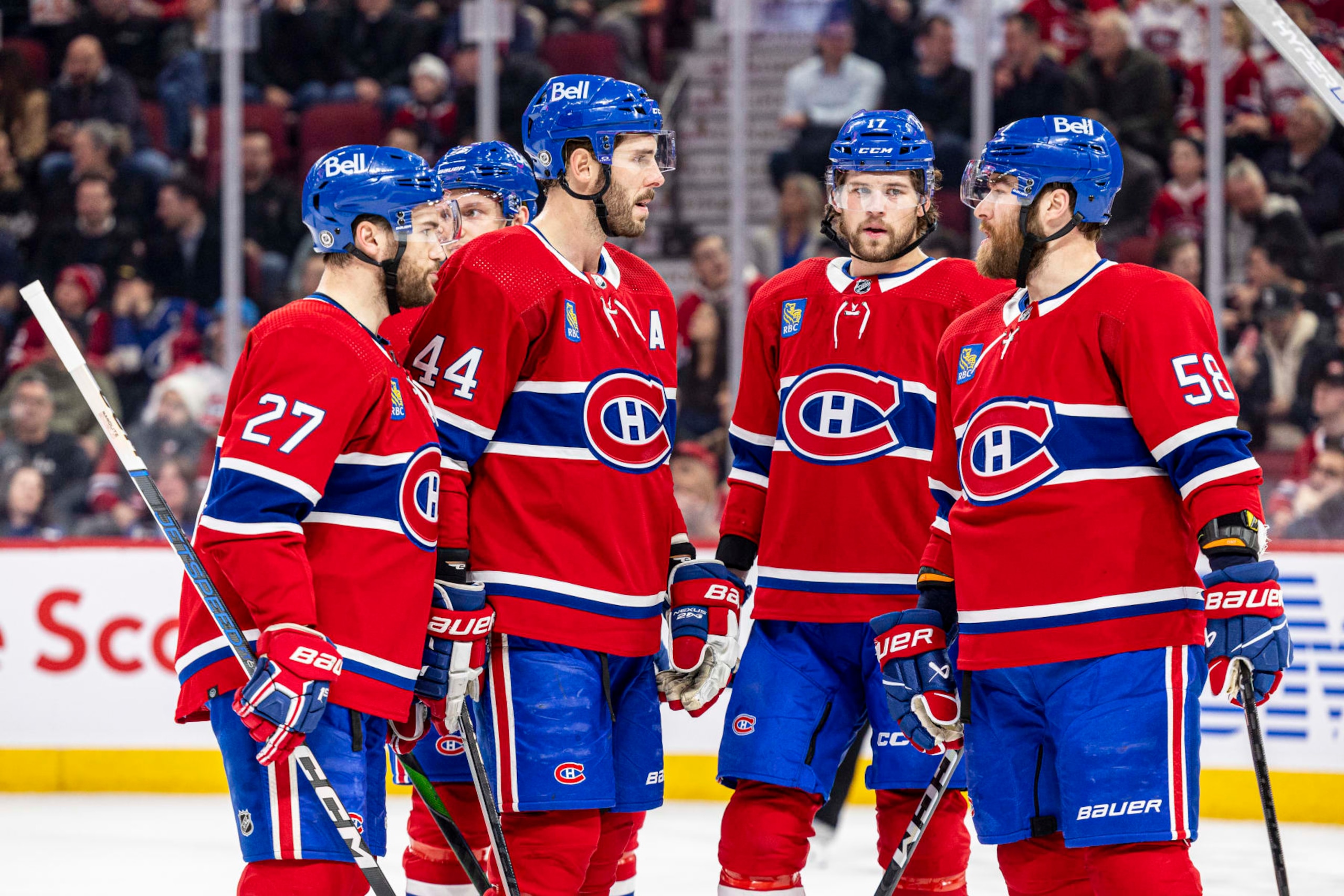 MONTREAL, CANADA - MARCH 21: Montreal Canadiens talk before the play during the first period of the NHL regular season game between the Montreal Canadiens and the Tampa Bay Lightning at the Bell Centre on March 21, 2023 in Montreal, Quebec, Canada. (Photo by Vitor Munhoz/NHLI via Getty Images)