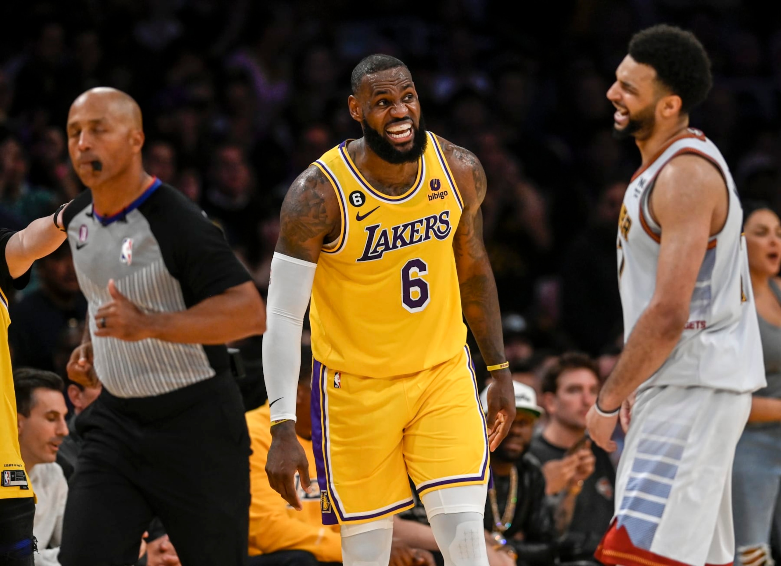 LOS ANGELES, CA - MAY 22: LeBron James (6) of the Los Angeles Lakers jaws with Jamal Murray (27) of the Denver Nuggets during the fourth quarter of the Nuggets' 113-111 Western Conference finals game 4 win at Crypto.com Arena in Los Angeles on Monday, May 22, 2023. The Nuggets swept the best-of-seven series 4-0 to advance to their first NBA Finals in franchise history. (Photo by AAron Ontiveroz/The Denver Post)