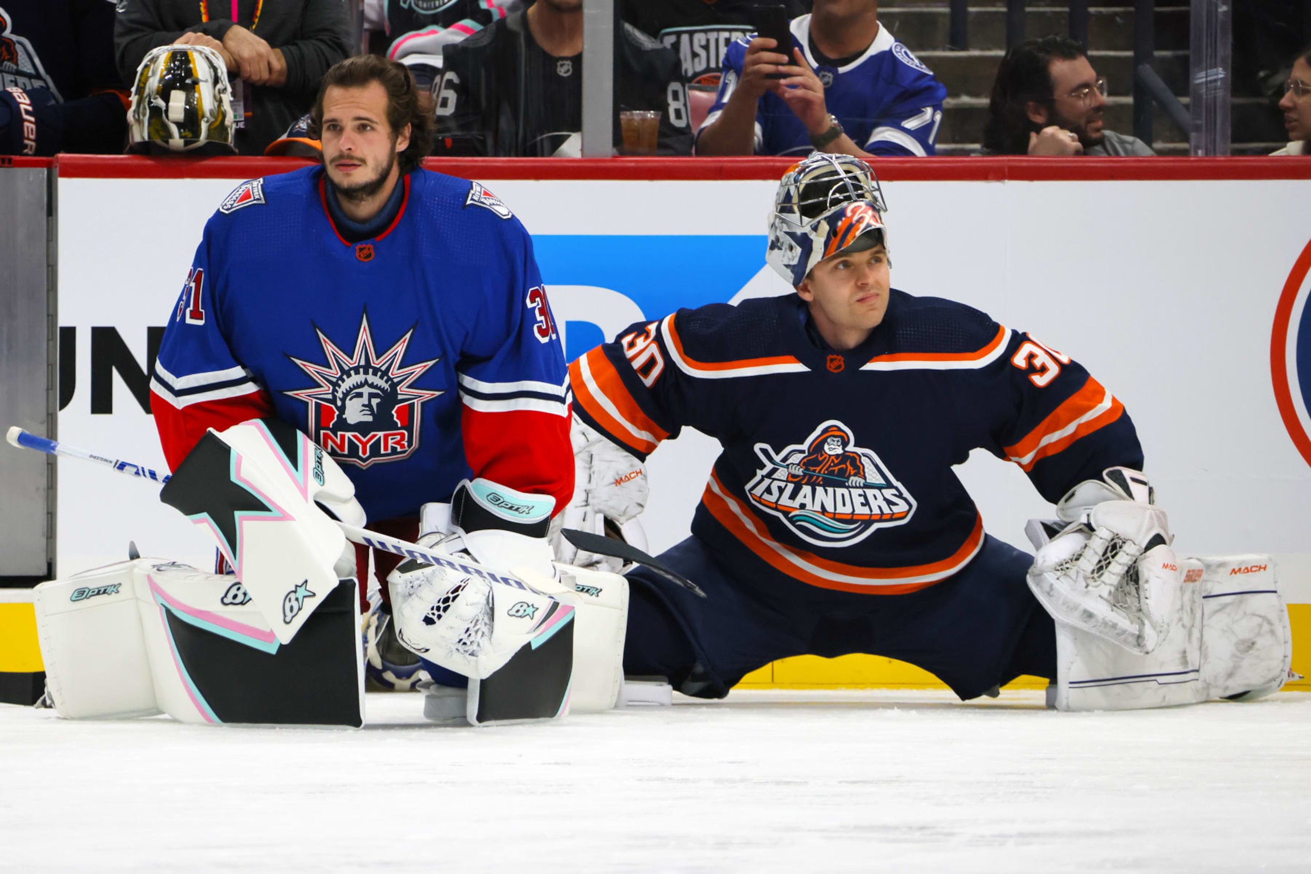 SUNRISE, FLORIDA - FEBRUARY 03: Igor Shesterkin #31 of the New York Rangers and Ilya Sorokin #30 of the New York Islanders warm up prior to the Discover NHL Tendy Tandem during the 2023 NHL All-Star Skills Competition at FLA Live Arena on February 03, 2023 in Sunrise, Florida. (Photo by Bruce Bennett/Getty Images)