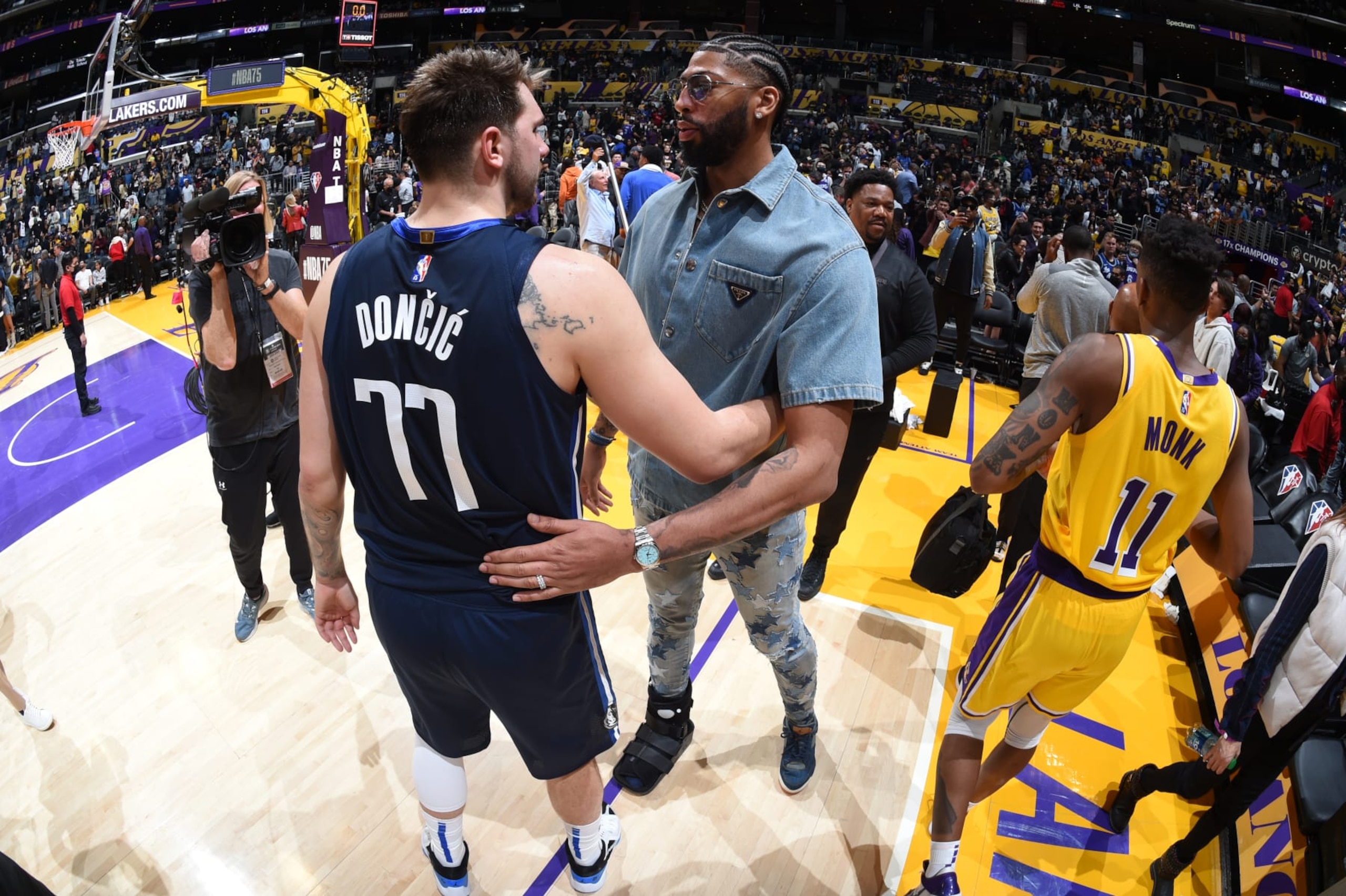 LOS ANGELES, CA - MARCH 1: Luka Doncic #77 of the Dallas Mavericks talks to Anthony Davis #3 of the Los Angeles Lakers after the game on March 1, 2022 at Crypto.Com Arena in Los Angeles, California. NOTE TO USER: User expressly acknowledges and agrees that, by downloading and/or using this Photograph, user is consenting to the terms and conditions of the Getty Images License Agreement. Mandatory Copyright Notice: Copyright 2022 NBAE (Photo by Andrew D. Bernstein/NBAE via Getty Images)