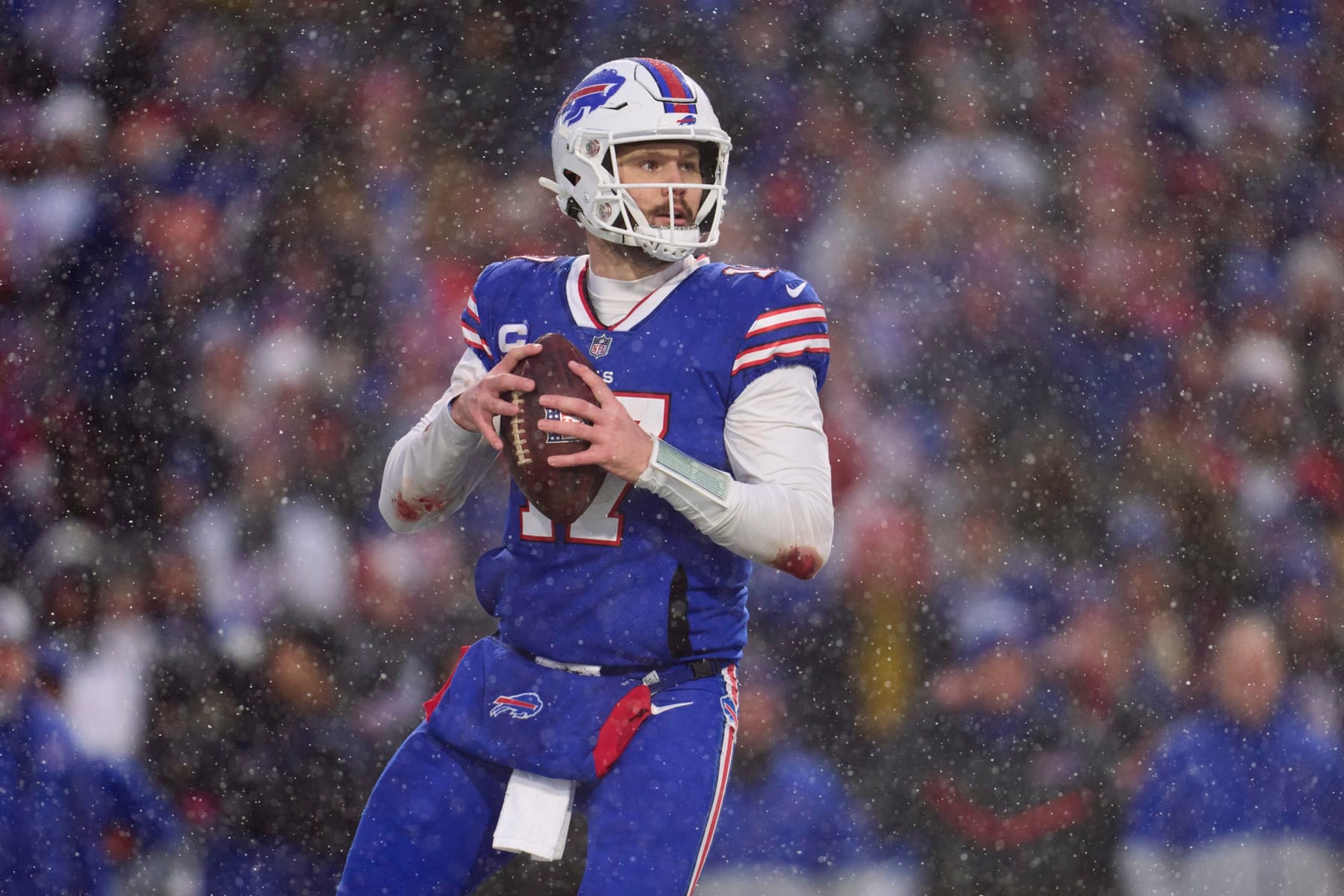 ORCHARD PARK, NY - JANUARY 22: Josh Allen #17 of the Buffalo Bills drops back to pass against the Cincinnati Bengals during the second half at Highmark Stadium on January 22, 2023 in Orchard Park, New York. (Photo by Cooper Neill/Getty Images) ORCHARD PARK, NY - JANUARY 22: Josh Allen #17 of the Buffalo Bills drops back to pass against the Cincinnati Bengals during the second half at Highmark Stadium on January 22, 2023 in Orchard Park, New York. (Photo by Cooper Neill/Getty Images)