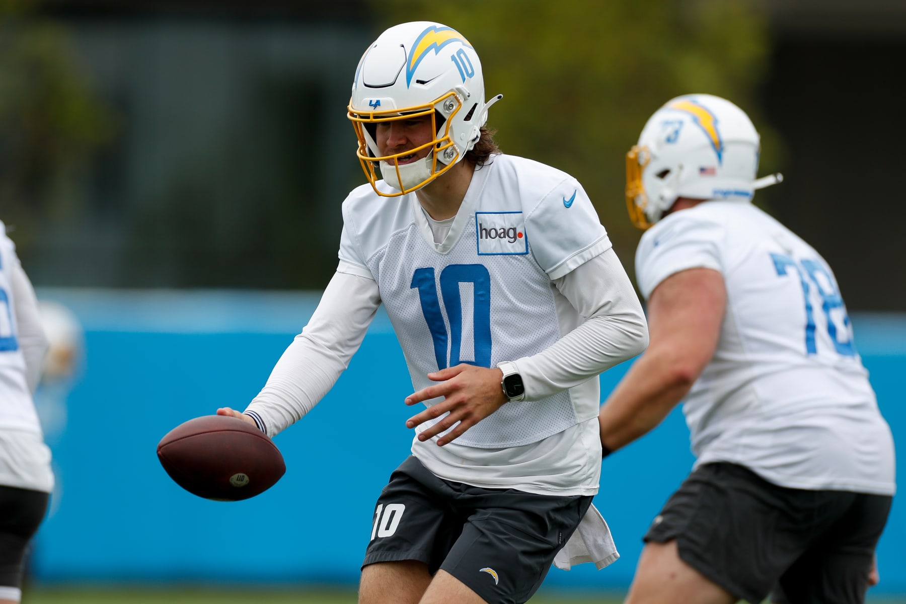 COSTA MESA, CA - MAY 22: Los Angeles Chargers quarterback Justin Herbert (10) takes part in a drill during the team's OTA practice on May 22, 2023, at the Hoag Performance Center in Costa Mesa, CA. (Photo by Brandon Sloter/Icon Sportswire via Getty Images)