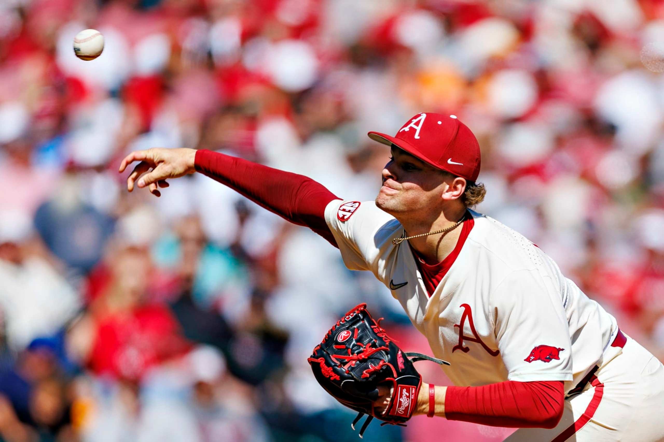 FAYETTEVILLE, ARKANSAS - APRIL 16: Dylan Carter #31 of the Arkansas Razorbacks throws a pitch during a game against the Tennessee Volunteers at Baum-Walker Stadium at George Cole Field on April 16, 2023 in Fayetteville, Arkansas. The Razorbacks defeated the Volunteers 7-2.  (Photo by Wesley Hitt/Getty Images)
