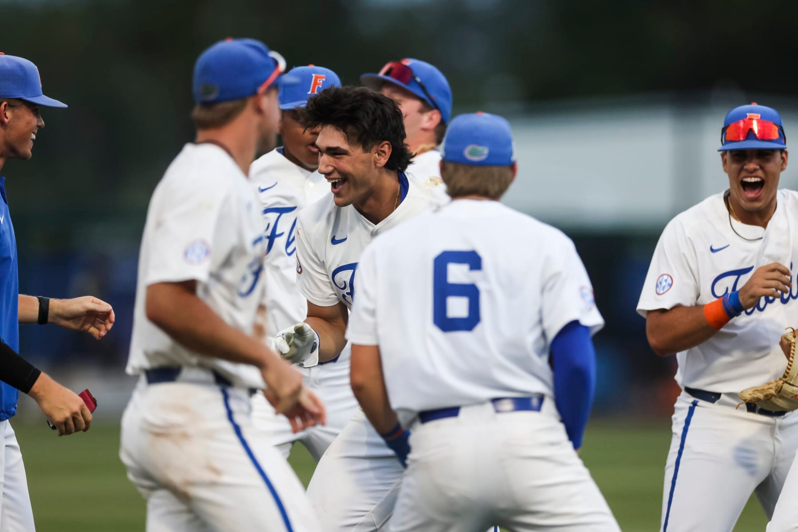 GAINESVILLE, FLORIDA - MAY 12: Jac Caglianone #14 of the Florida Gators celebrates with teammates after hitting the game-winning run against the Vanderbilt Commodores at Condron Family Ballpark on May 12, 2023 in Gainesville, Florida. (Photo by James Gilbert/Getty Images)