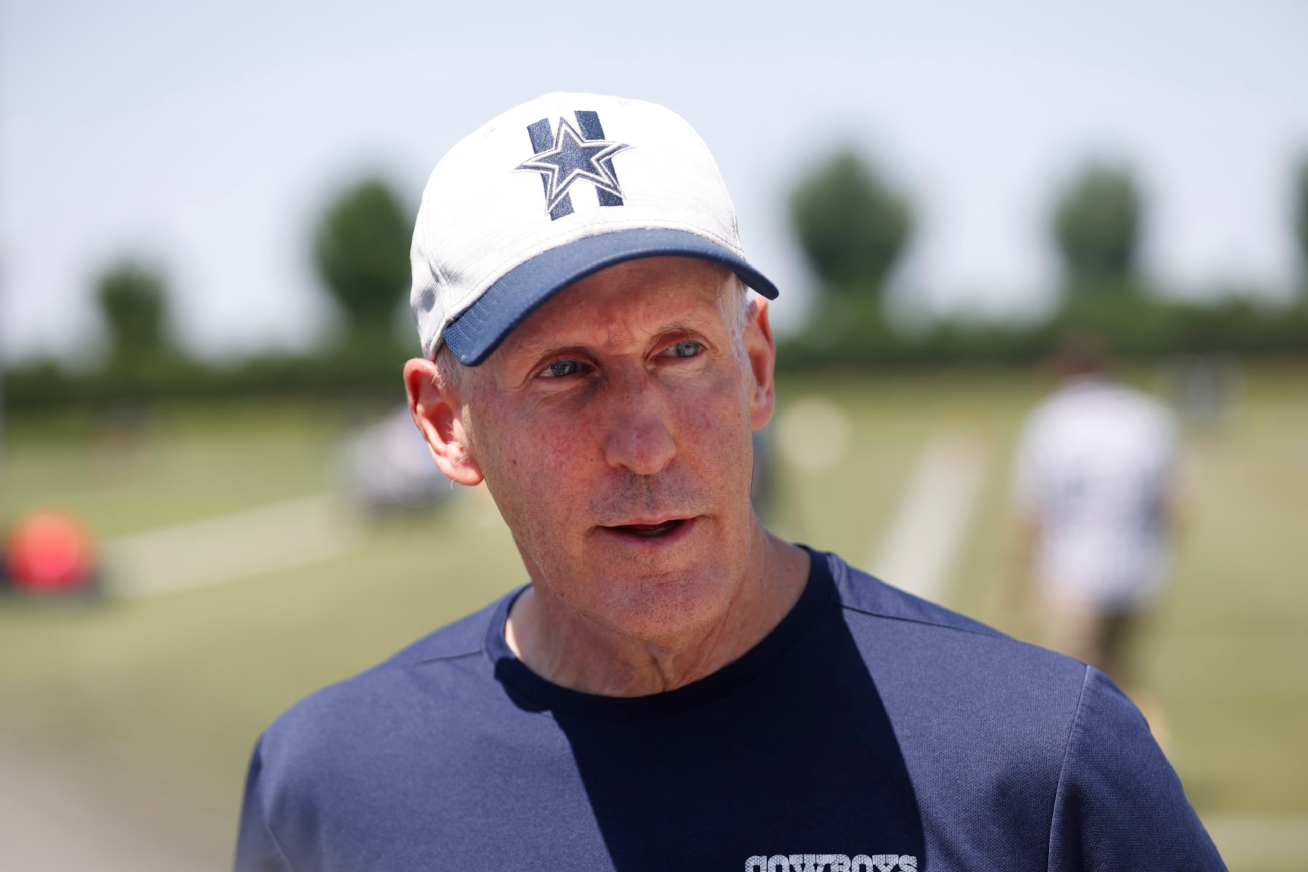 Dallas Cowboys offensive line coach Joe Philbin talks the the media during the NFL football team's rookie minicamp in Frisco, Texas, Friday, May 13, 2022. (AP Photo/Michael Ainsworth)