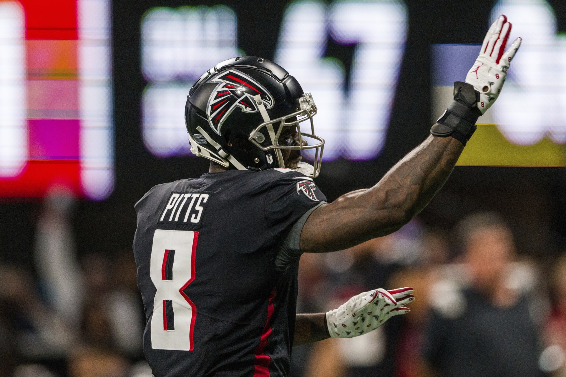 Atlanta Falcons tight end Kyle Pitts (8) signals for a first down during the second half of an NFL football game against the Carolina Panthers, Sunday, Oct. 30, 2022, in Atlanta. The Atlanta Falcons won 37-34. (AP Photo/Danny Karnik)