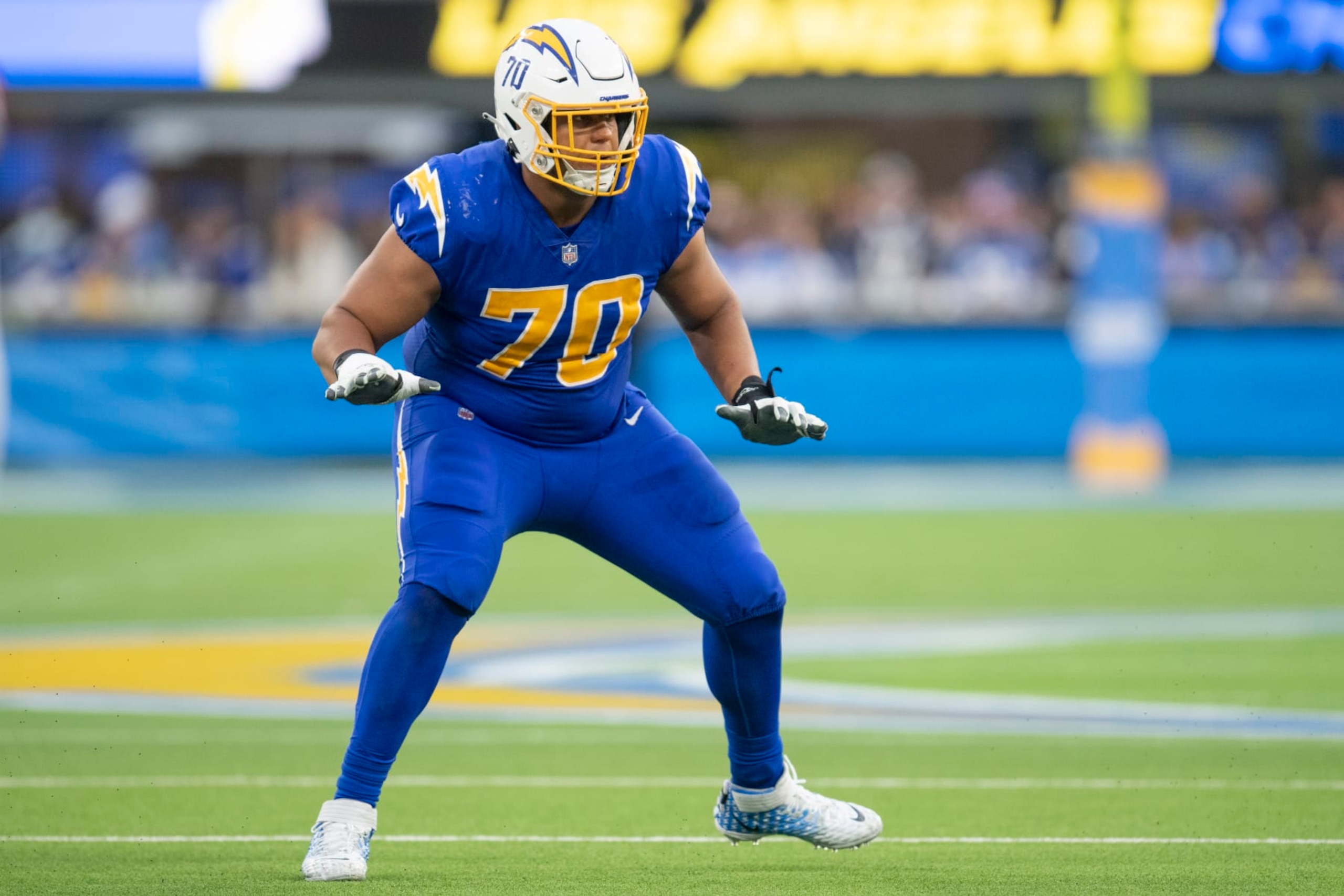 Los Angeles Chargers offensive tackle Rashawn Slater (70) takes his stance during an NFL football game against the New York Giants Sunday, Dec. 12, 2021, in Inglewood, Calif. (AP Photo/Kyusung Gong) Los Angeles Chargers offensive tackle Rashawn Slater (70) takes his stance during an NFL football game against the New York Giants Sunday, Dec. 12, 2021, in Inglewood, Calif. (AP Photo/Kyusung Gong)