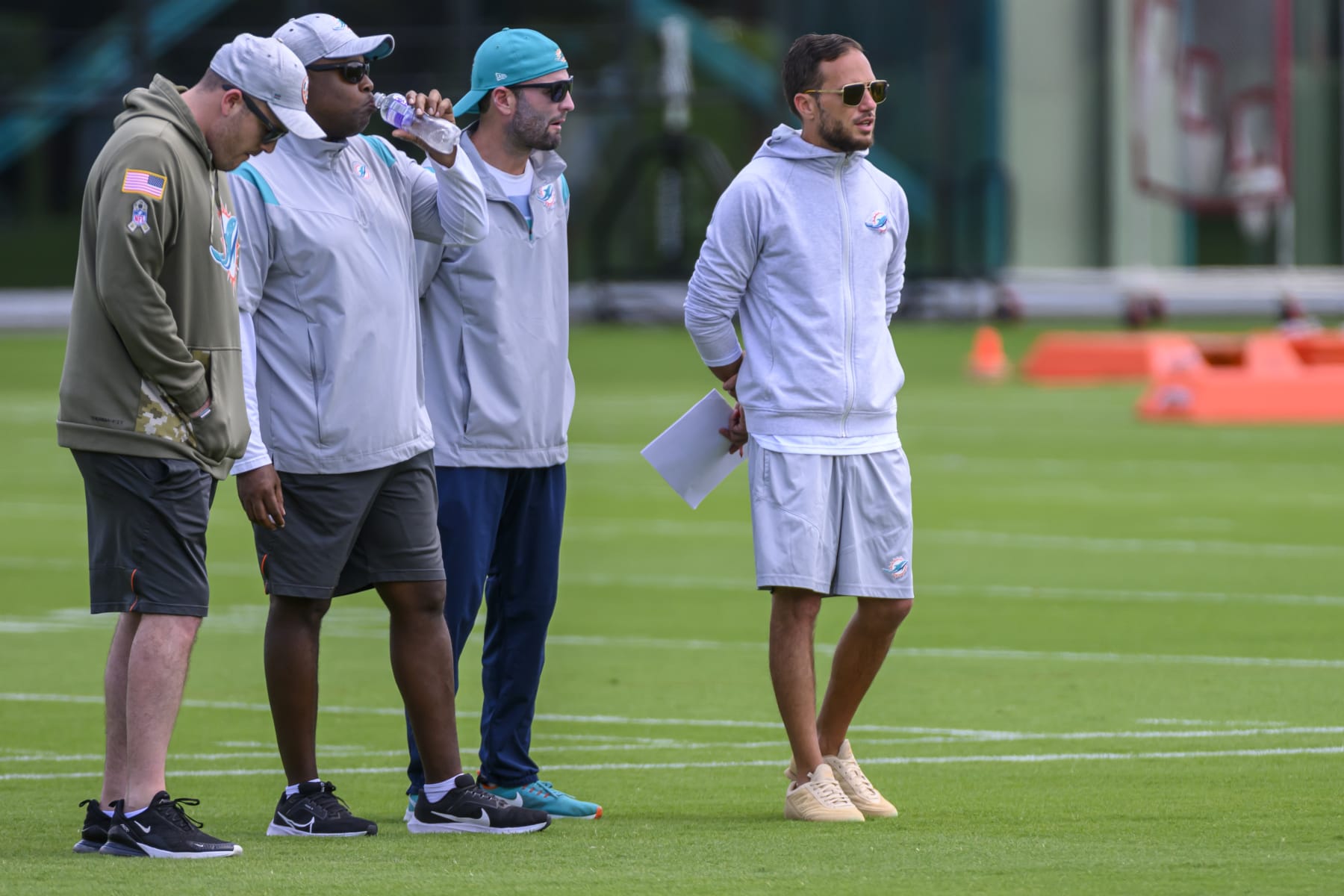 MIAMI GARDENS, FL - MAY 12: From right, Miami Dolphins head coach Mike McDaniel and Miami Dolphins wide receivers coach Wes Walker watches the players on the field during the rookie minicamp at the Baptist Health Training Complex on May 12, 2023 in Miami Gardens, Florida. (Photo by Doug Murray/Icon Sportswire via Getty Images)