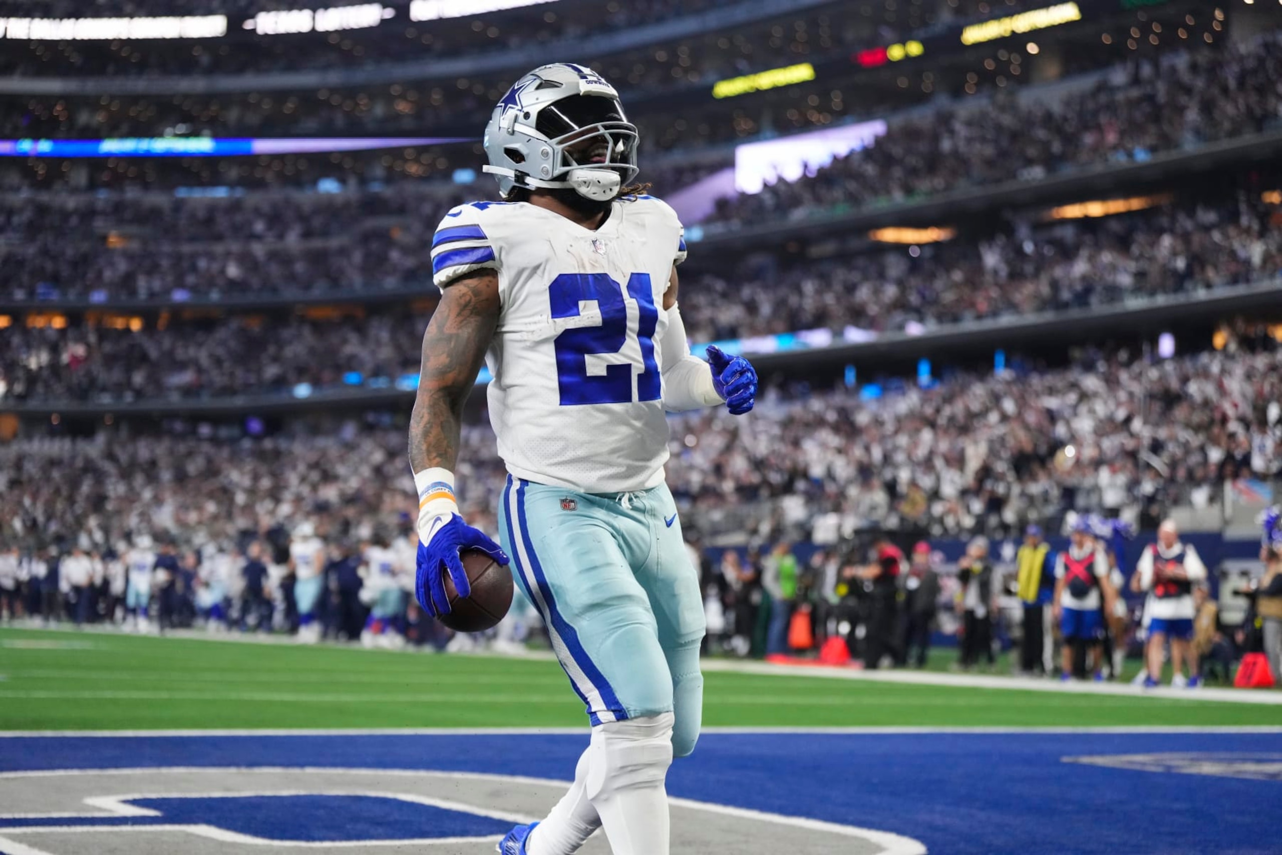 ARLINGTON, TX - DECEMBER 24: Ezekiel Elliott #21 of the Dallas Cowboys celebrates after the touchdown against the Philadelphia Eagles at AT&T Stadium on December 24, 2022 in Arlington, Texas. (Photo by Cooper Neill/Getty Images)