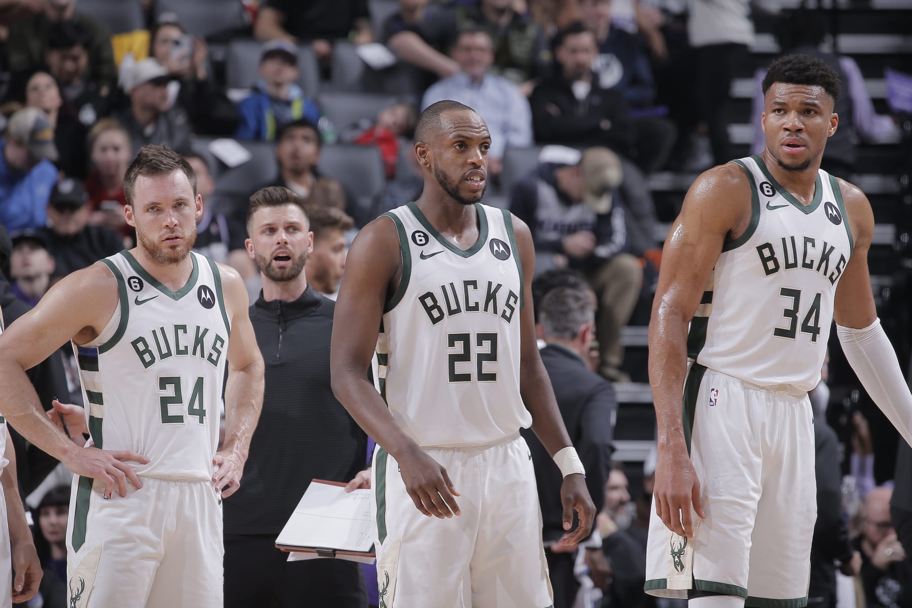 SACRAMENTO, CA - MARCH 13: Pat Connaughton #24, Khris Middleton #22, and Giannis Antetokounmpo #34 of the Milwaukee Bucks look on during the game against the Sacramento Kings on March 13, 2023 at Golden 1 Center in Sacramento, California. NOTE TO USER: User expressly acknowledges and agrees that, by downloading and or using this photograph, User is consenting to the terms and conditions of the Getty Images Agreement. Mandatory Copyright Notice: Copyright 2023 NBAE (Photo by Rocky Widner/NBAE via Getty Images)