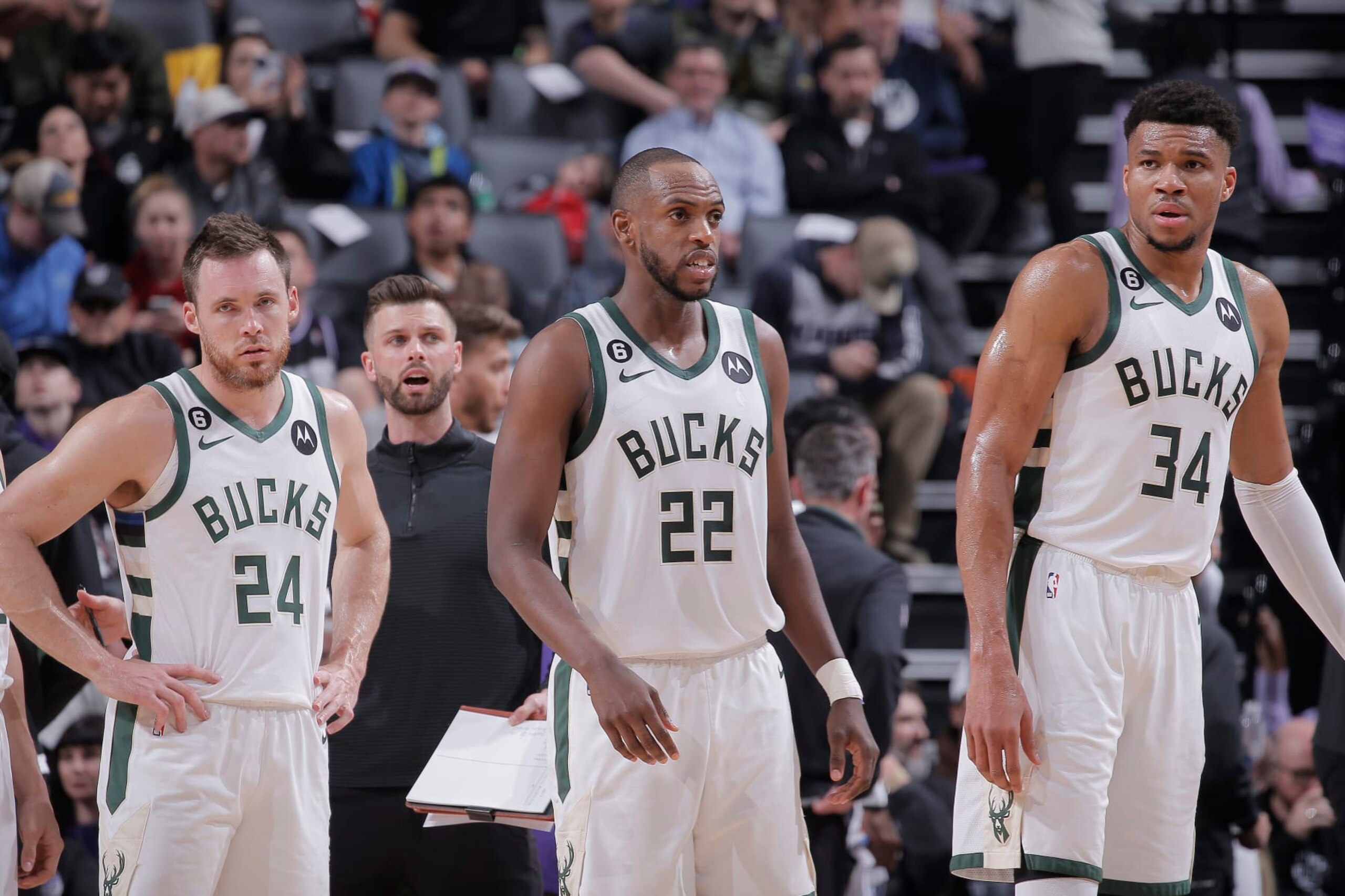 SACRAMENTO, CA - MARCH 13: Pat Connaughton #24, Khris Middleton #22, and Giannis Antetokounmpo #34 of the Milwaukee Bucks look on during the game against the Sacramento Kings on March 13, 2023 at Golden 1 Center in Sacramento, California. NOTE TO USER: User expressly acknowledges and agrees that, by downloading and or using this photograph, User is consenting to the terms and conditions of the Getty Images Agreement. Mandatory Copyright Notice: Copyright 2023 NBAE (Photo by Rocky Widner/NBAE via Getty Images)