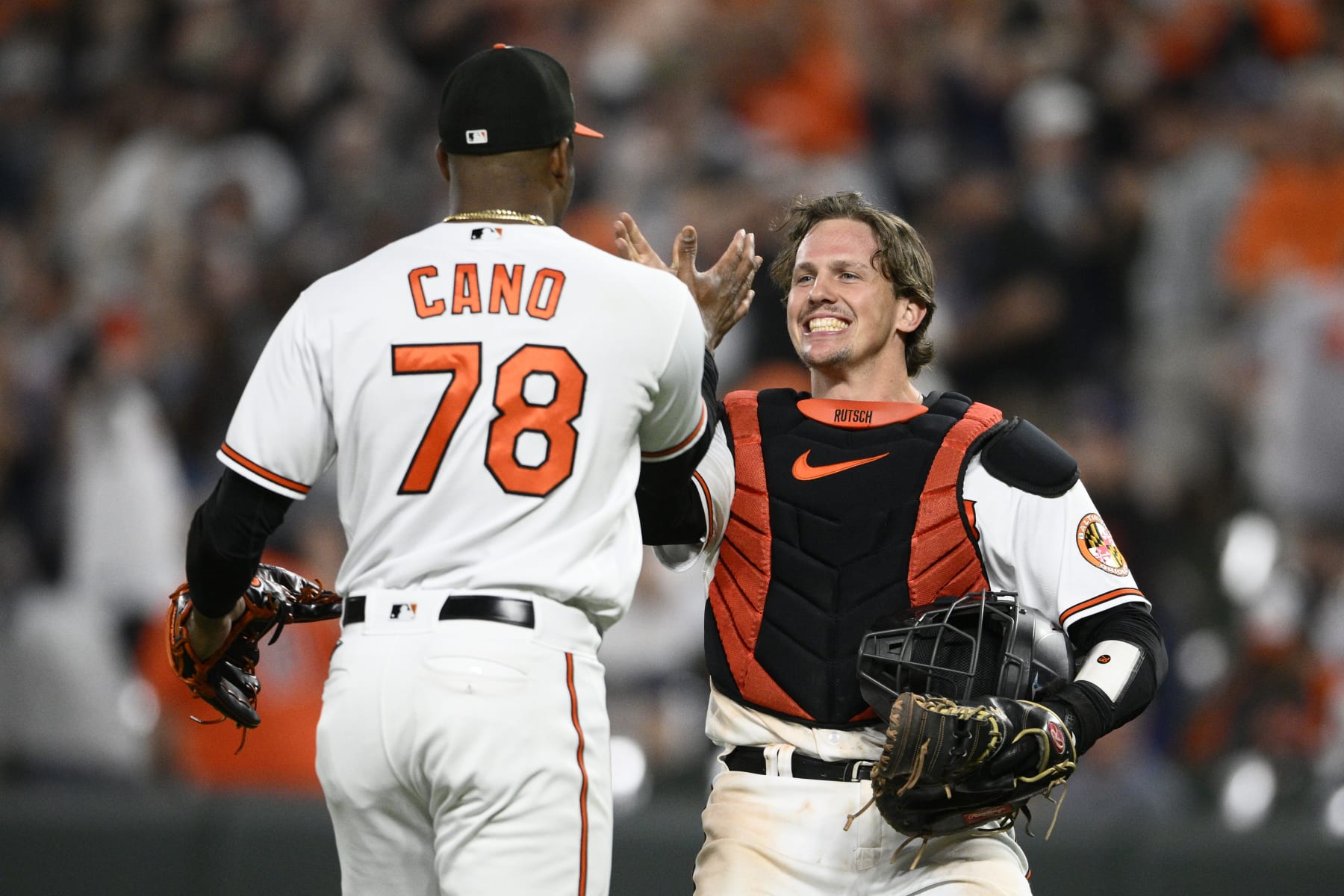 Yennier Cano (L) and Adley Rutschman (R)