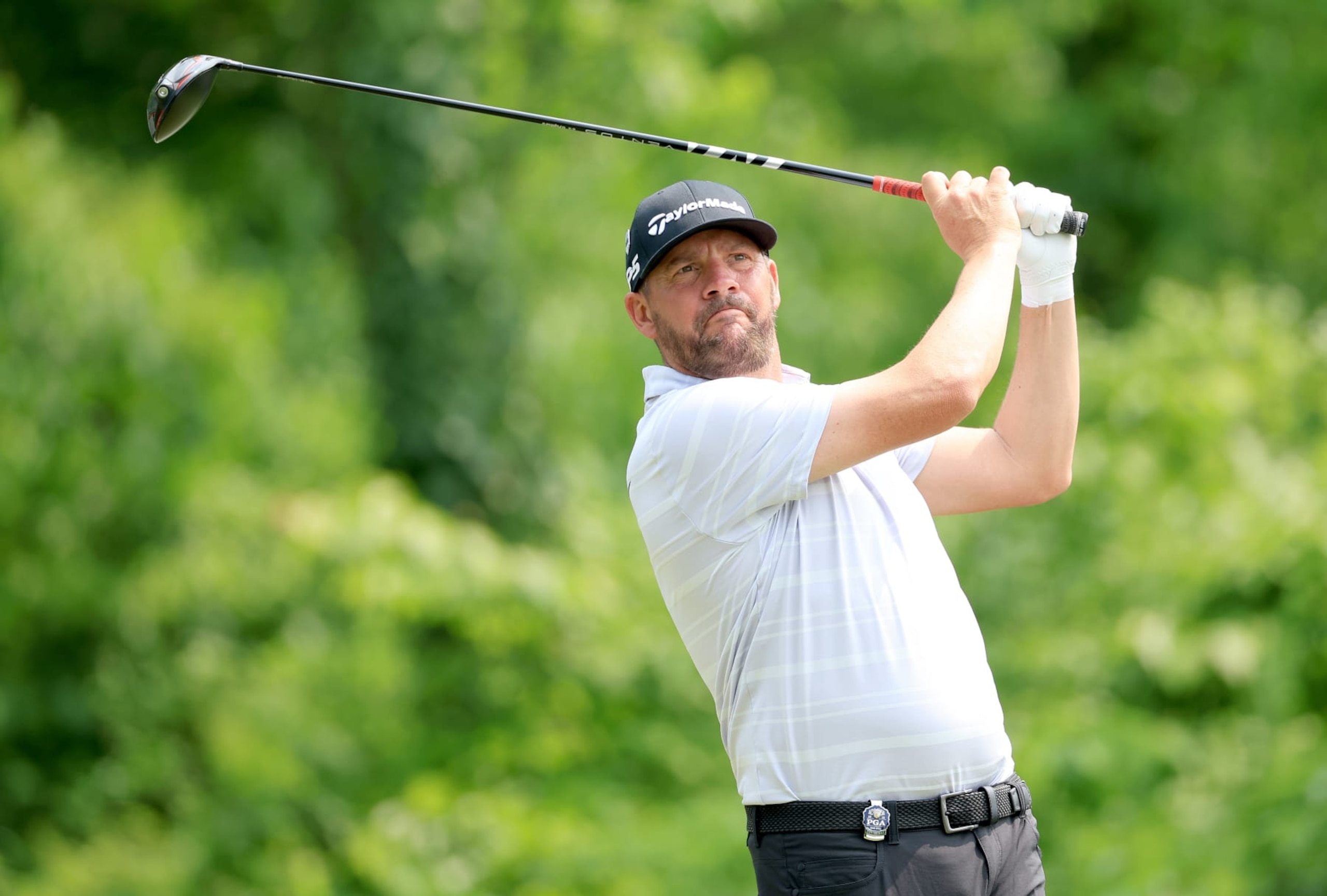 ROCHESTER, NEW YORK - MAY 21: Michael Block of The United States plays his tee shot on the fourth hole during the final round of the 2023 PGA Championship at Oak Hill Country Club on May 21, 2023 in Rochester, New York. (Photo by David Cannon/Getty Images) ROCHESTER, NEW YORK - MAY 21: Michael Block of The United States plays his tee shot on the fourth hole during the final round of the 2023 PGA Championship at Oak Hill Country Club on May 21, 2023 in Rochester, New York. (Photo by David Cannon/Getty Images)
