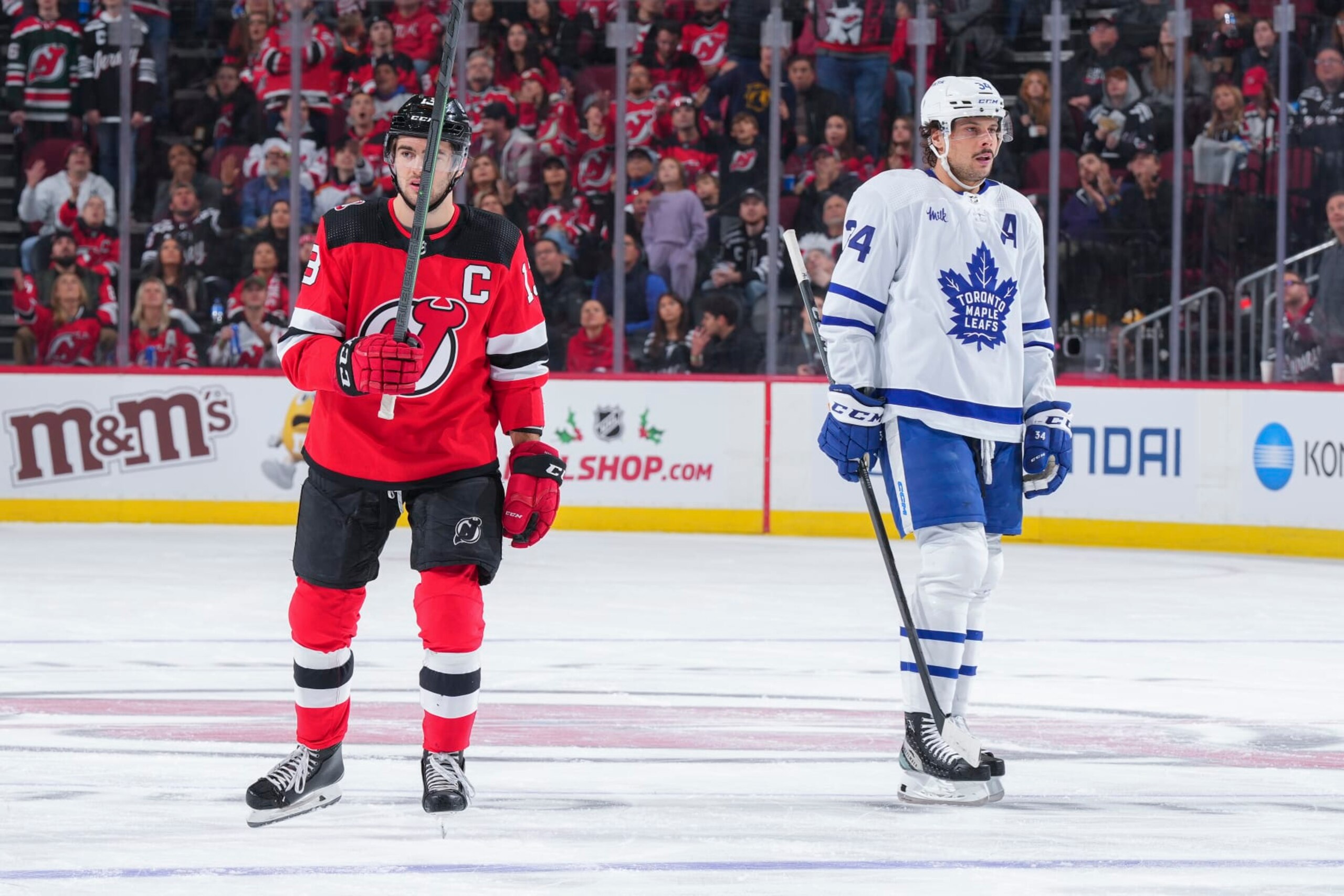 New Jersey Devils captain Nico Hischier (left) and Toronto Maple Leafs center Auston Matthews. New Jersey Devils captain Nico Hischier (left) and Toronto Maple Leafs center Auston Matthews.
