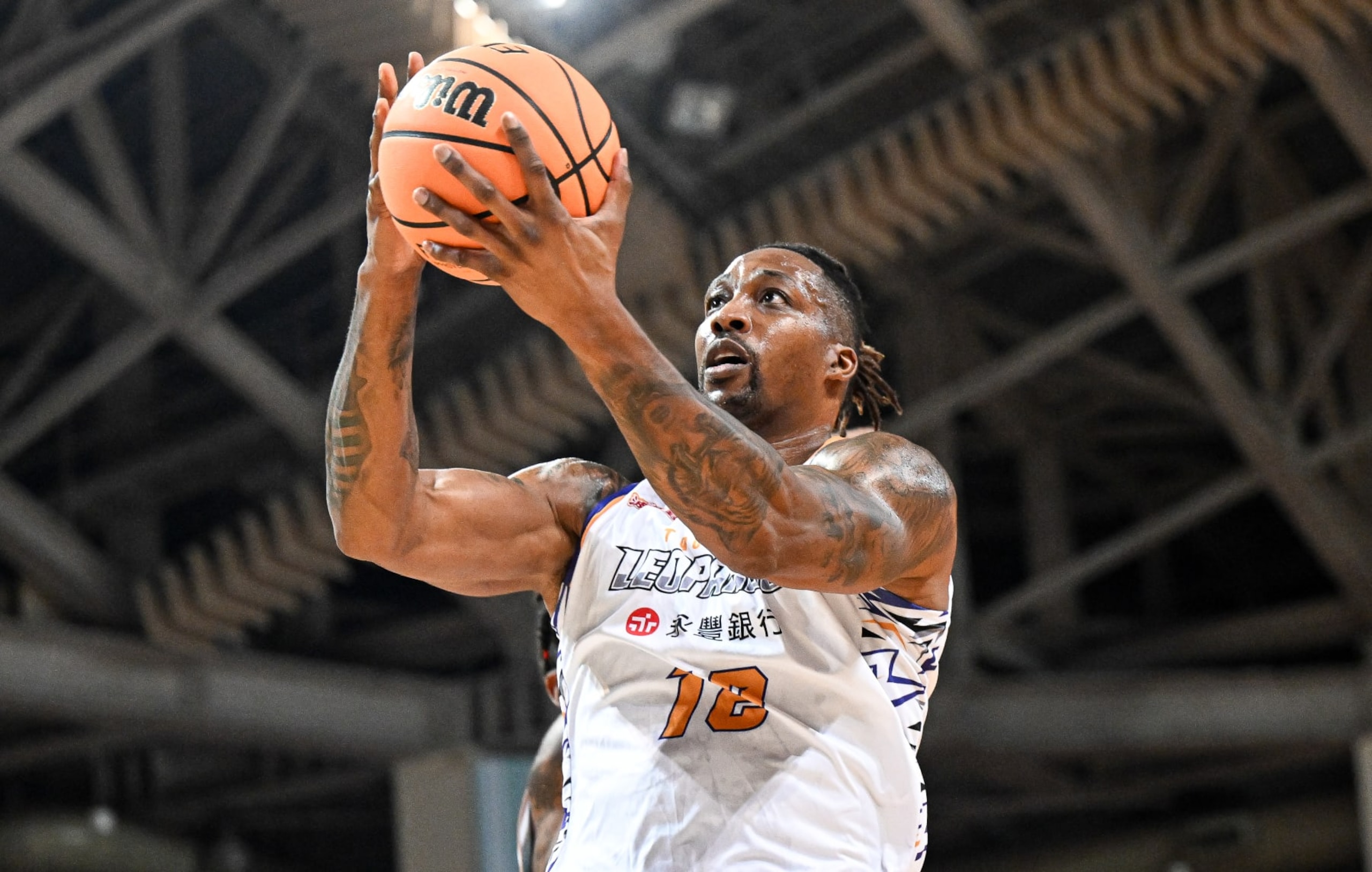 TAIPEI, TAIWAN - FEBRUARY 19: Dwight Howard #12 of the Taoyuan Leopard made a layup shot during the T1 League game between TaiwanBeer HeroBears and Taoyuan Leopards at University of Taipei Tianmu Gymnasium on February 19, 2023 in Taipei, Taiwan. (Photo by Gene Wang/Getty Images)