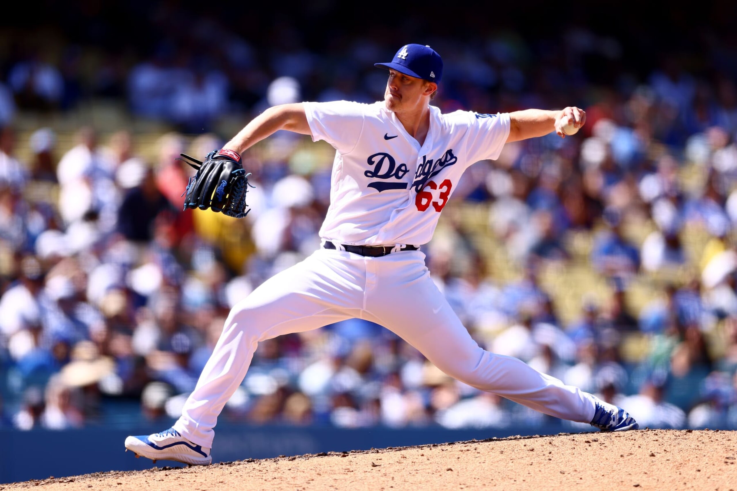 LOS ANGELES, CALIFORNIA - APRIL 19: Justin Bruihl #63 of the Los Angeles Dodgers throws a pitch during the eighth inning against the New York Mets at Dodger Stadium on April 19, 2023 in Los Angeles, California. (Photo by Katelyn Mulcahy/Getty Images)