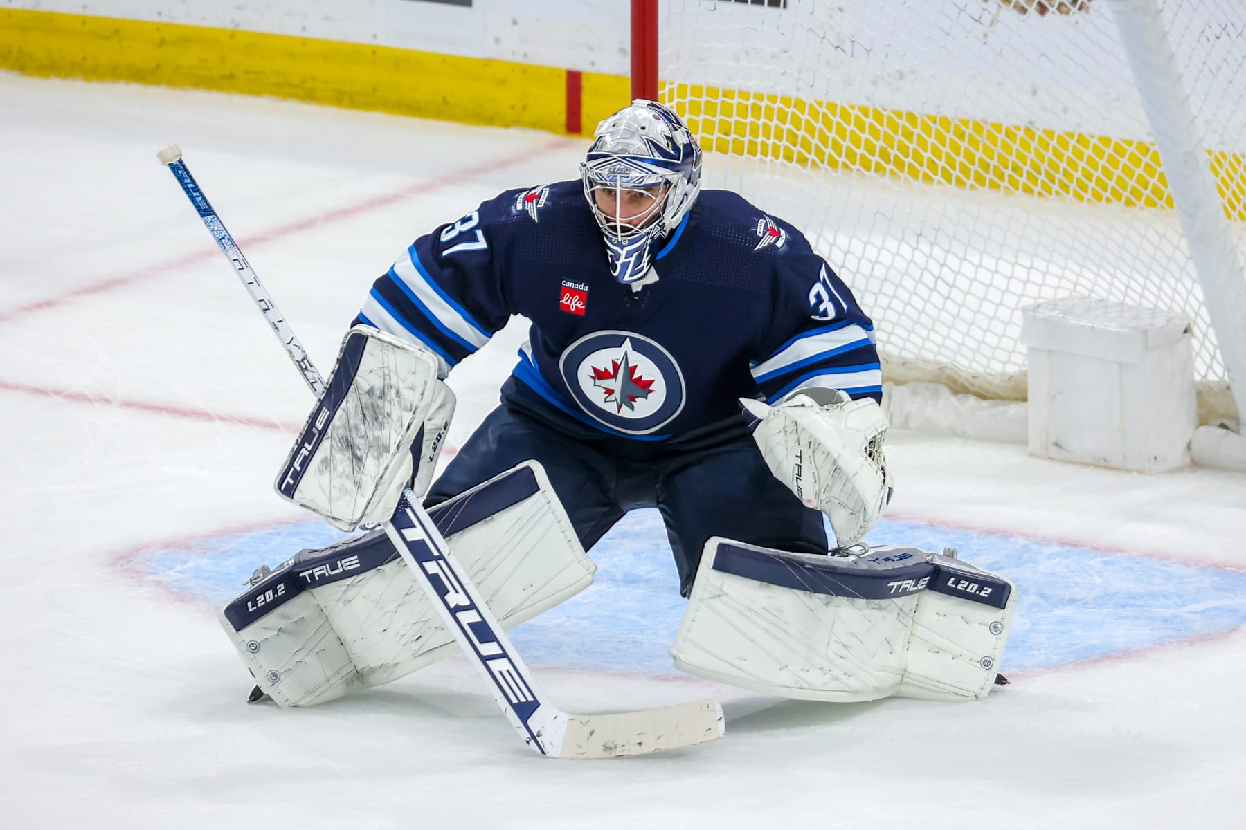 WINNIPEG, CANADA - APRIL 24: Goaltender Connor Hellebuyck #37 of the Winnipeg Jets guards the net during third period action against the Vegas Golden Knights in Game Four of the First Round of the 2023 Stanley Cup Playoffs at Canada Life Centre on April 24, 2023 in Winnipeg, Manitoba, Canada. (Photo by Jonathan Kozub/NHLI via Getty Images)
