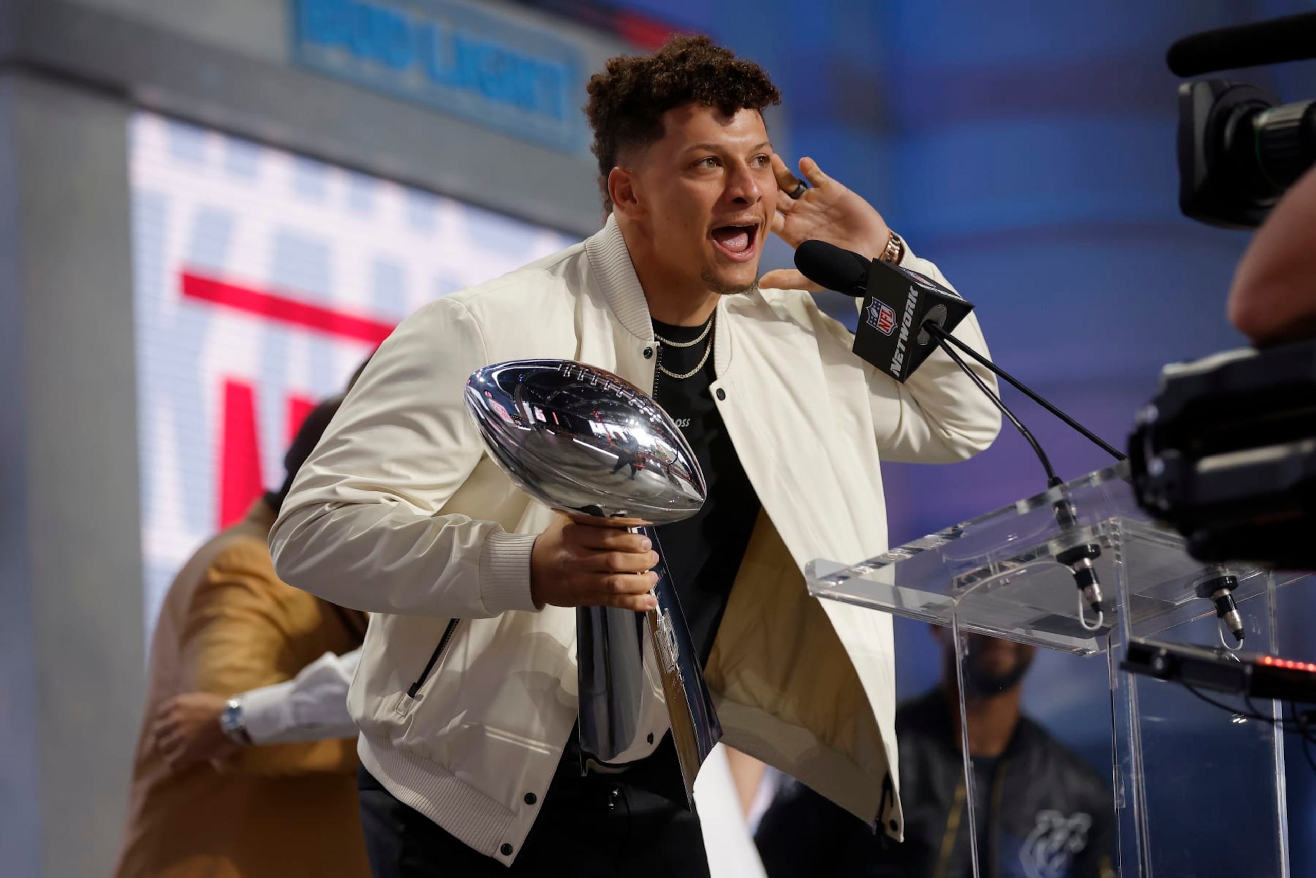 KANSAS CITY, MISSOURI - APRIL 27: Patrick Mahomes #15 of the Kansas City Chiefs celebrates onstage with the Vince Lombardi Trophy during the first round of the 2023 NFL Draft at Union Station on April 27, 2023 in Kansas City, Missouri. (Photo by David Eulitt/Getty Images)