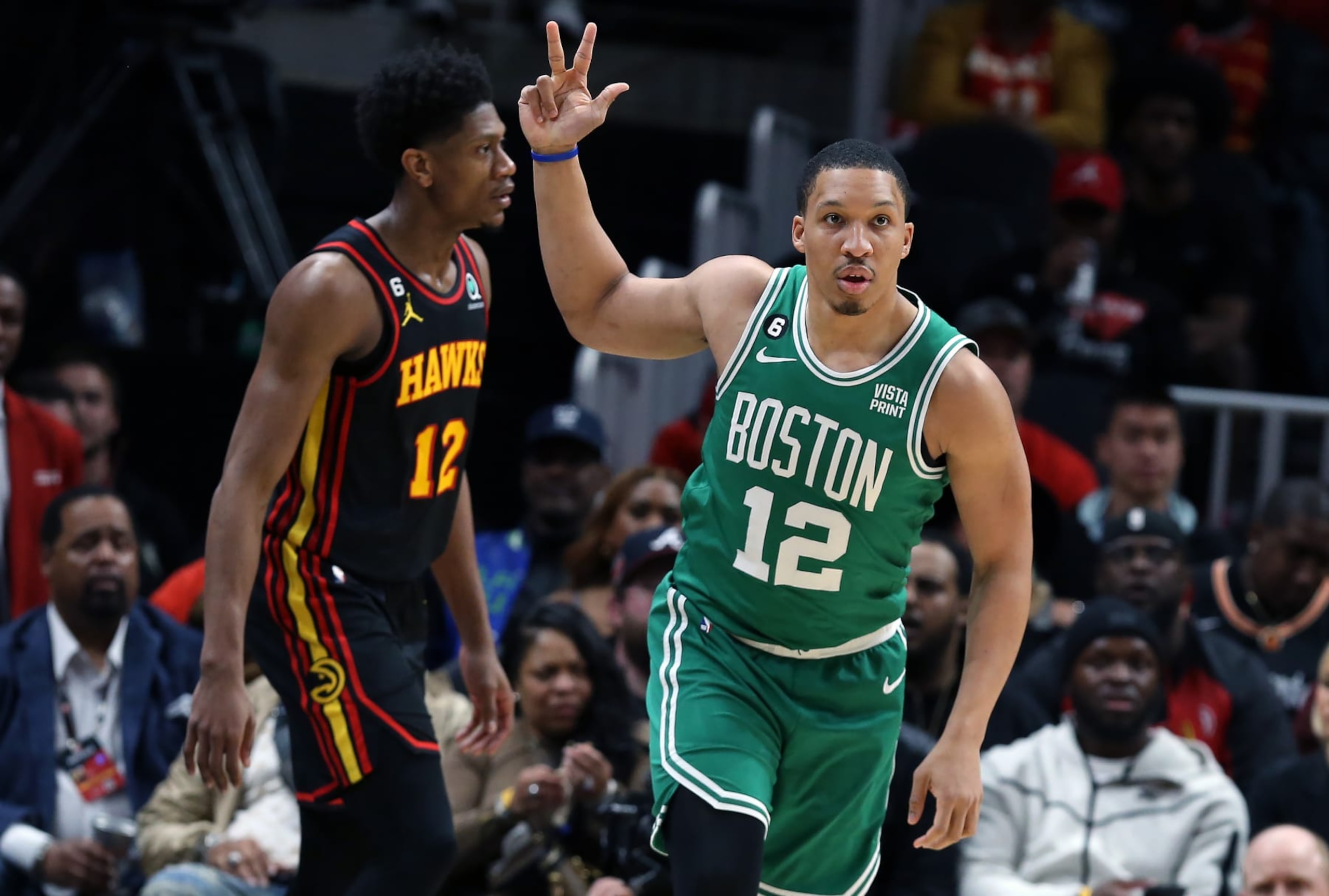 Atlanta, GA - April 27: Boston Celtics PF Grant Williams holds up three fingers after hitting a 3-pointer. The Celtics beat the Atlanta Hawks, 128-120, in Game 6 of their Eastern Conference First Round Series. (Photo by Jim Davis/The Boston Globe via Getty Images)