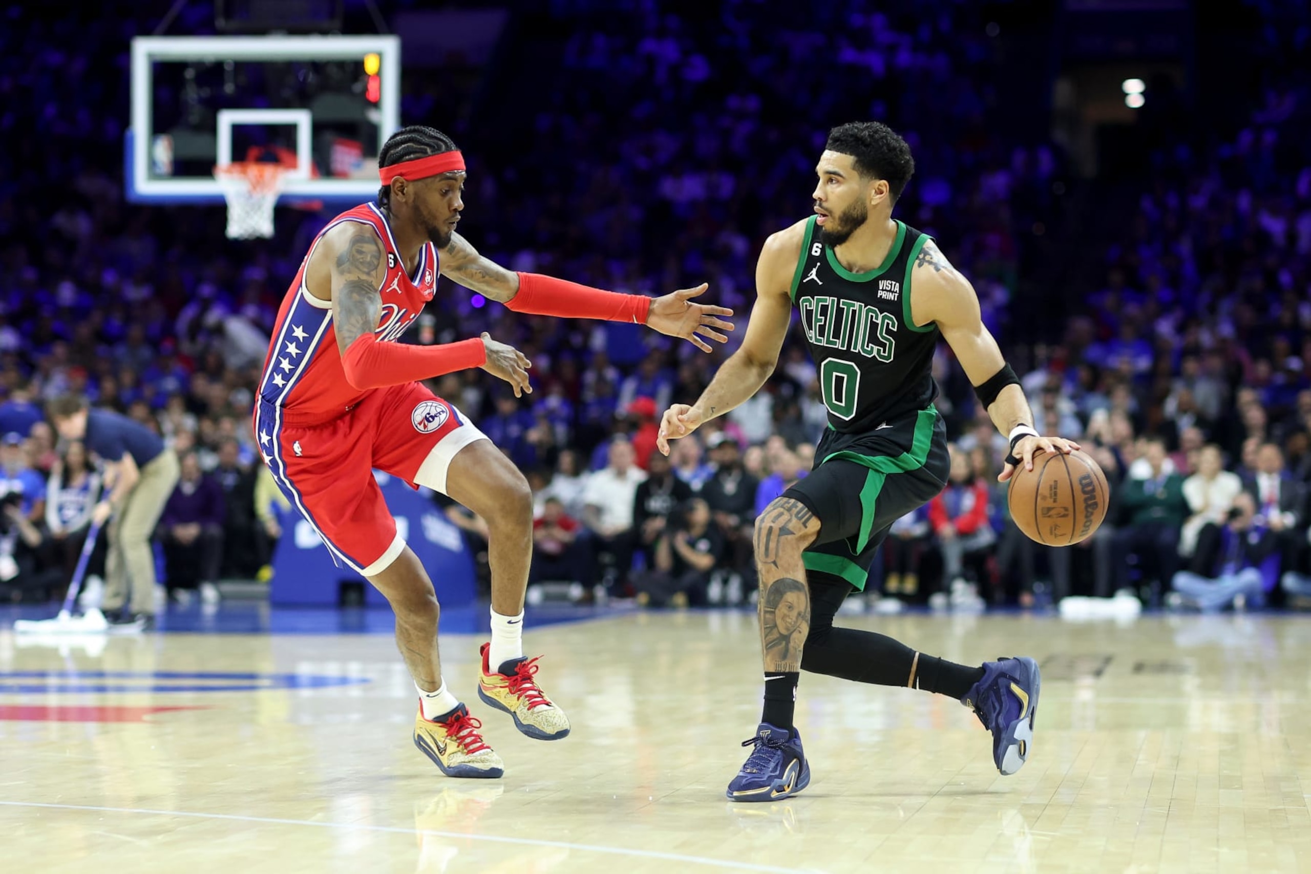 PHILADELPHIA, PENNSYLVANIA - MAY 05: Jayson Tatum #0 of the Boston Celtics drives to the basket against Jalen McDaniels #7 of the Philadelphia 76ers during the first quarter in game three of the Eastern Conference Second Round Playoffs at Wells Fargo Center on May 05, 2023 in Philadelphia, Pennsylvania. NOTE TO USER: User expressly acknowledges and agrees that, by downloading and or using this photograph, User is consenting to the terms and conditions of the Getty Images License Agreement. (Photo by Tim Nwachukwu/Getty Images)